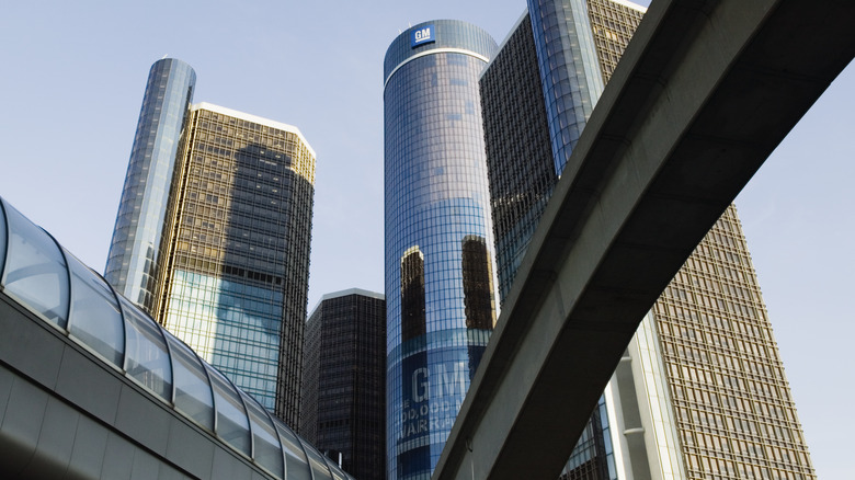 A low-angle shot of the GM world headquarters at the Renaissance Center in Detroit.