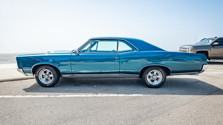 A 1967 Pontiac GTO in blue.