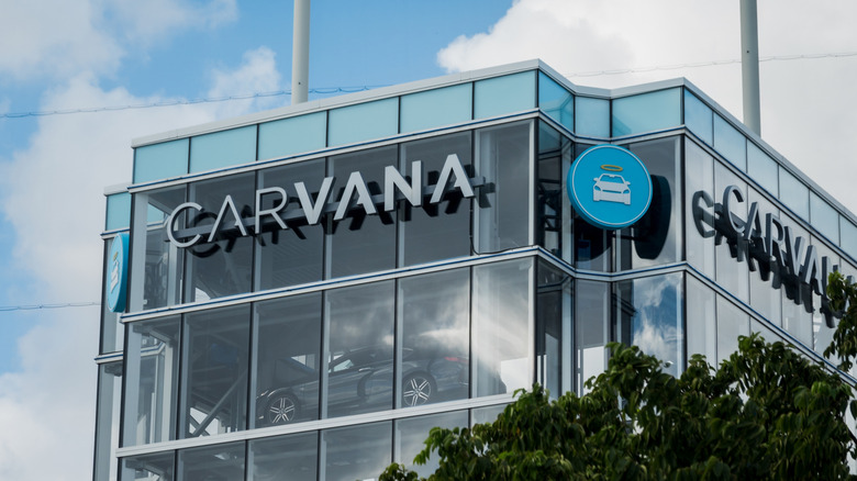 A Carvana Car Vending Machine is seen on a bright sunny day.