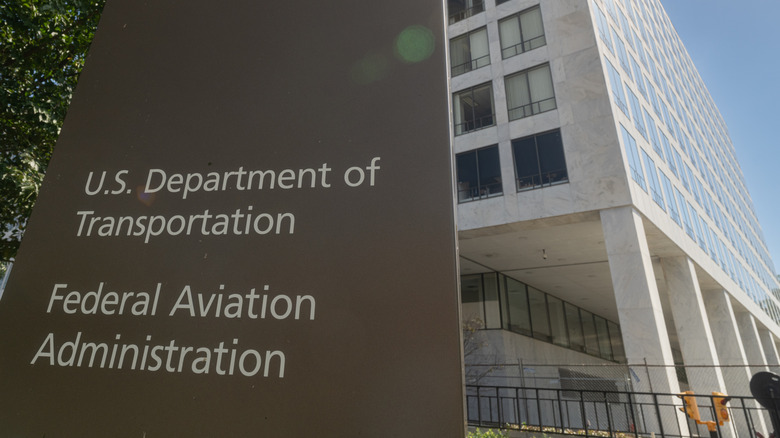 Photo of a sign pointing to the FAA head quarters.