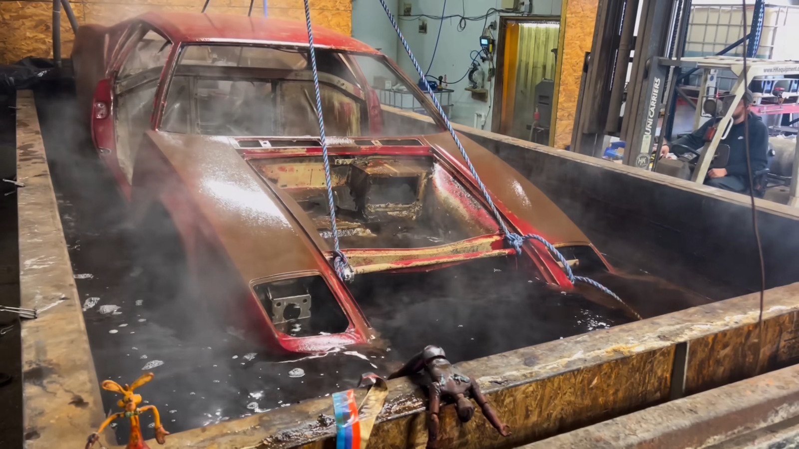 Watch A De Tomaso Pantera Go For A Paint-Stripping, Rust-Removing Bath