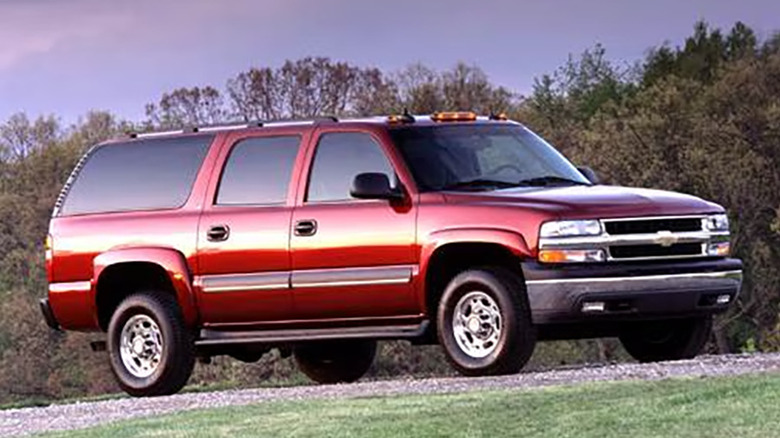 A red 2005 Chevy Suburban 2500