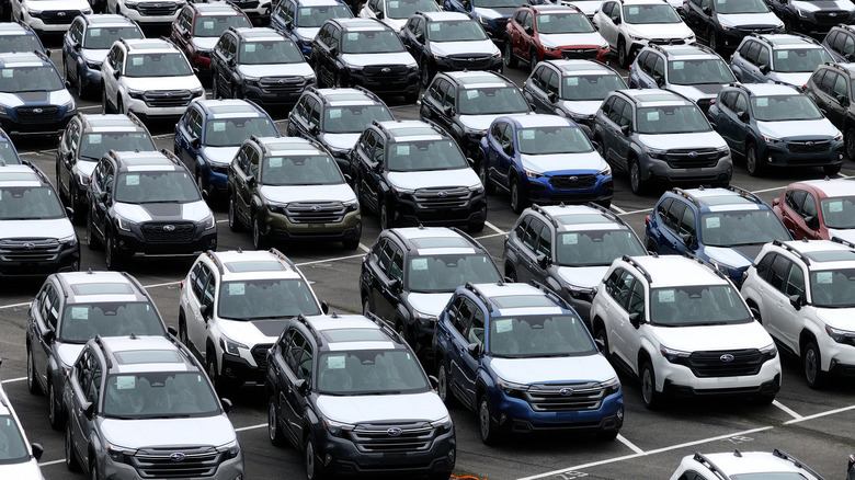 In an aerial view, brand new Subaru cars sit in a storage lot at Auto Warehouse Co. on March 04, 2025 in Richmond, California.