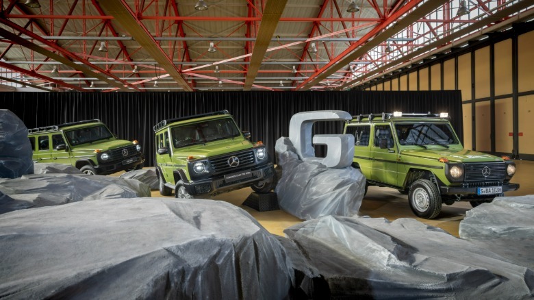 Three green Mercedes-Benz G-wagens
