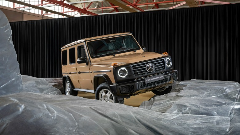 Front 3/4 view of a beige Mercedes-Benz G550 Edition Stronger Than The 1980s