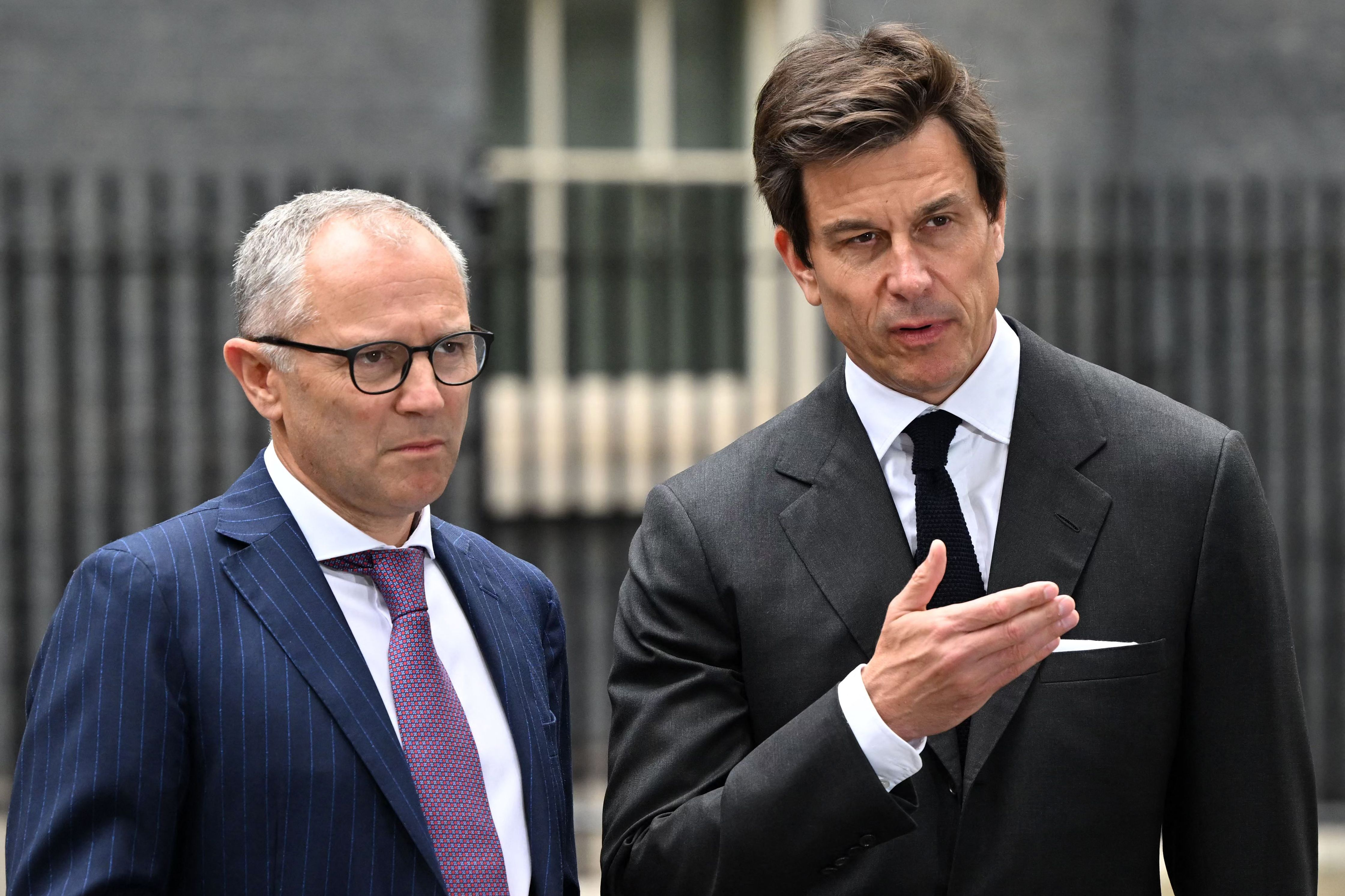 Formula One Group CEO Stefano Domenicali (L) and Mercedes F1 team principal Toto Wolff speak to the press during a visit to Downing Street in London on July 4, 2023 ahead of the British Grand Prix.