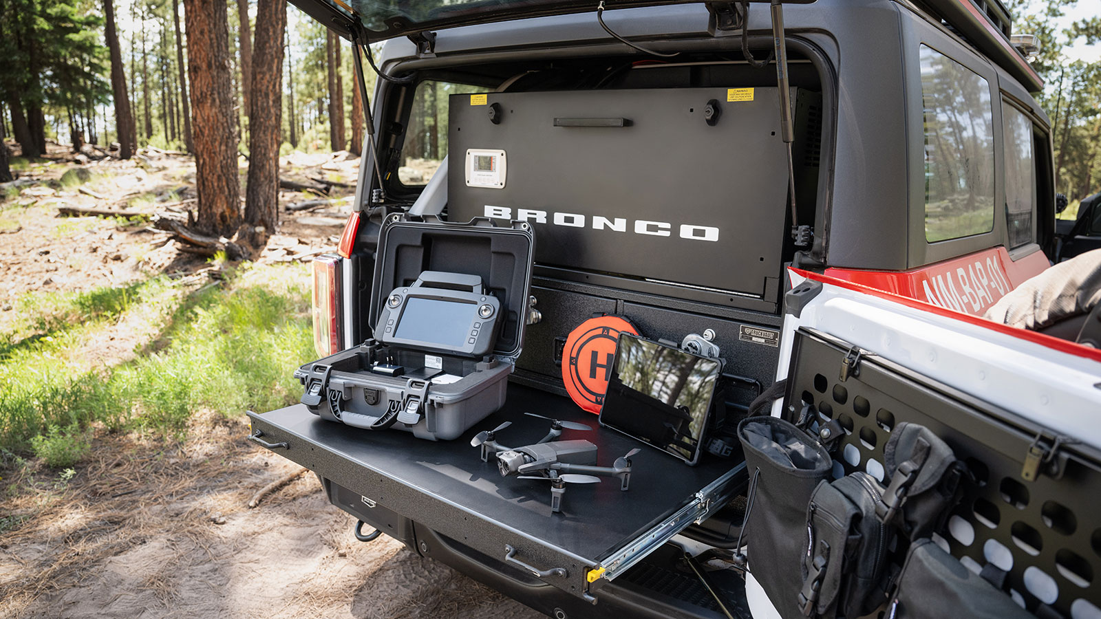 A photo of the trunk in the fire fighting Bronco and its drone.