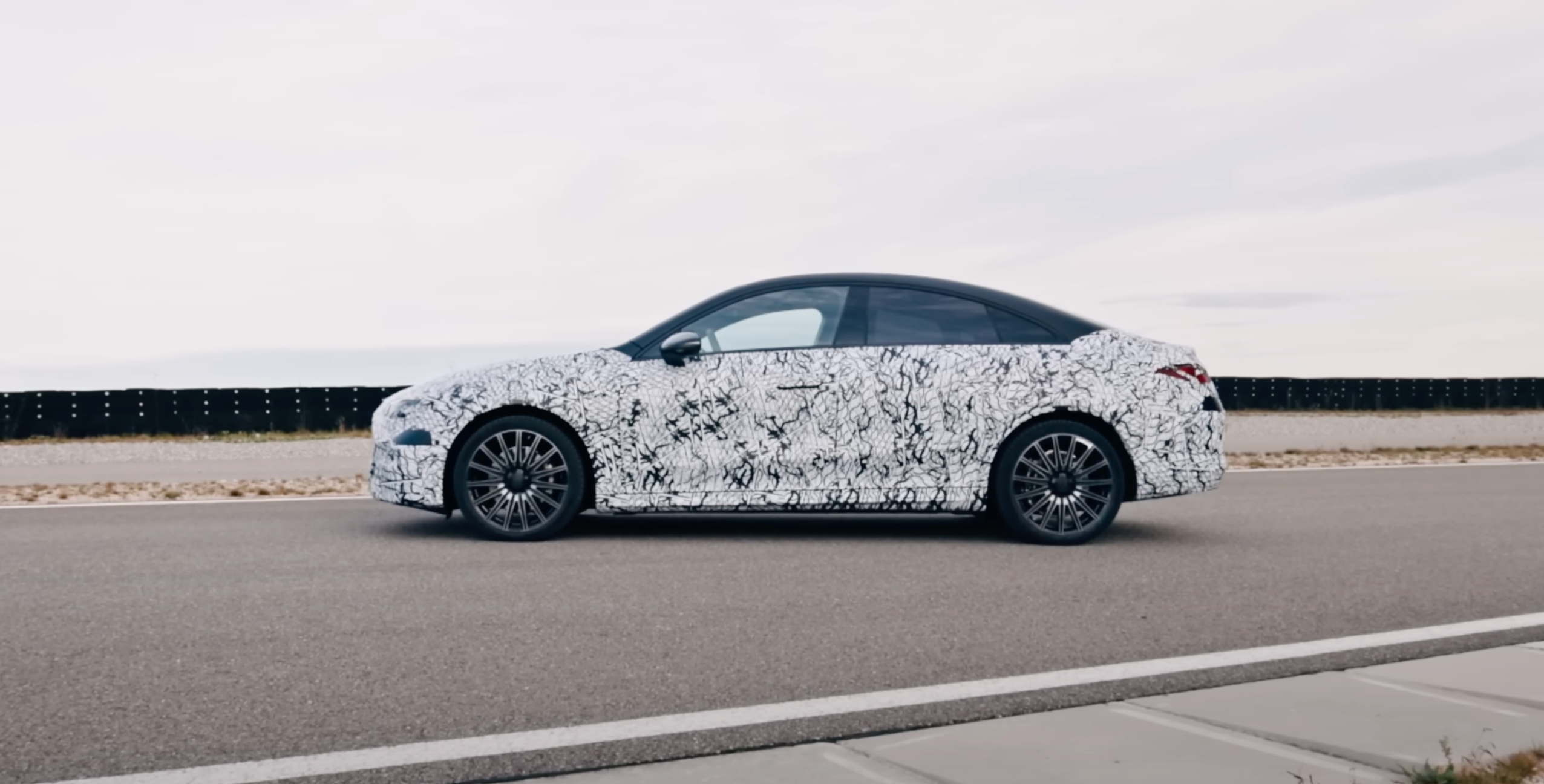 Side view of a camouflaged Mercedes-Benz CLA