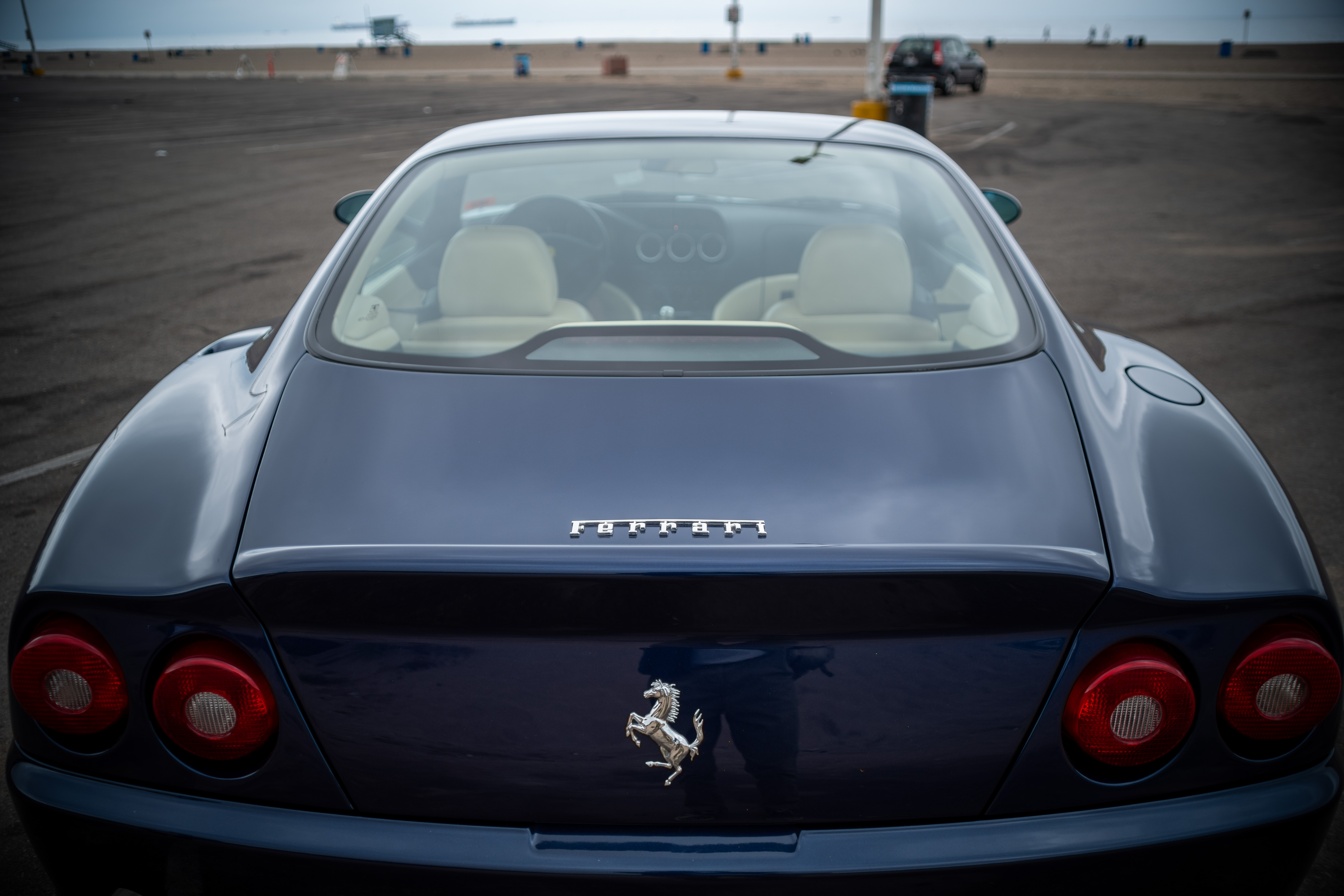 Rear view of a blue 1999 Ferrari 550 Maranello