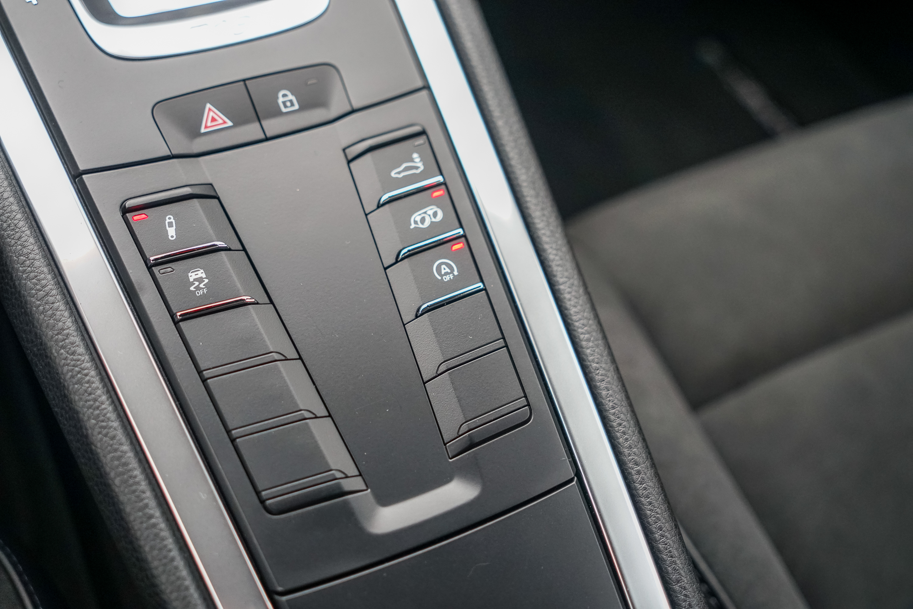 The center console of the 2022 Porsche Cayman GTS 4.0. There are many blank switches.