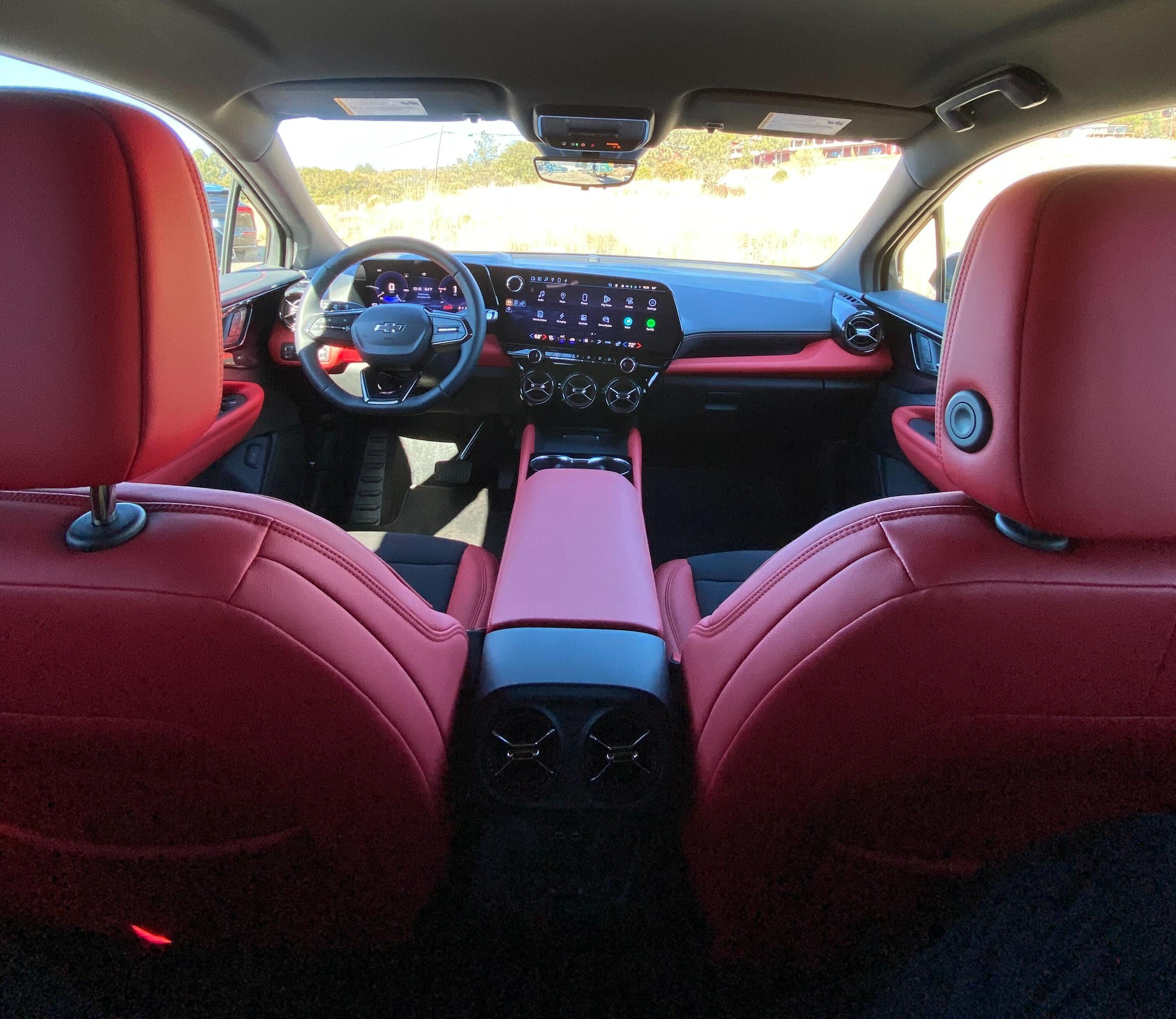 The view forward from the middle rear seat. The Blazer I drove had a red interior.