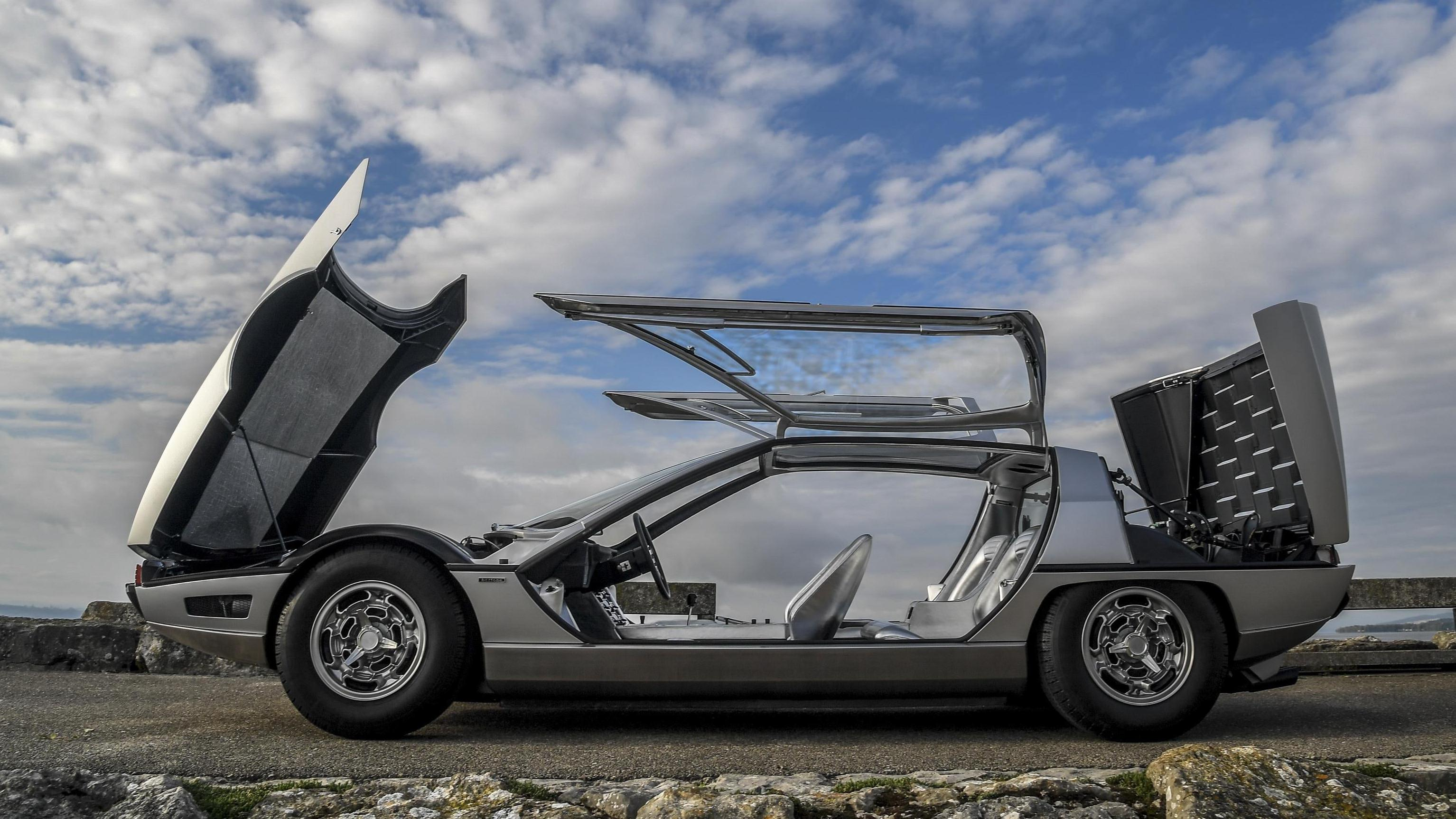 Side view of the silver Lamborghini Marzal concept with the doors open