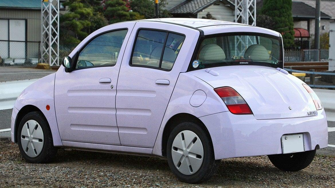 An immaculate lilac colored WiLL Vi from the rear