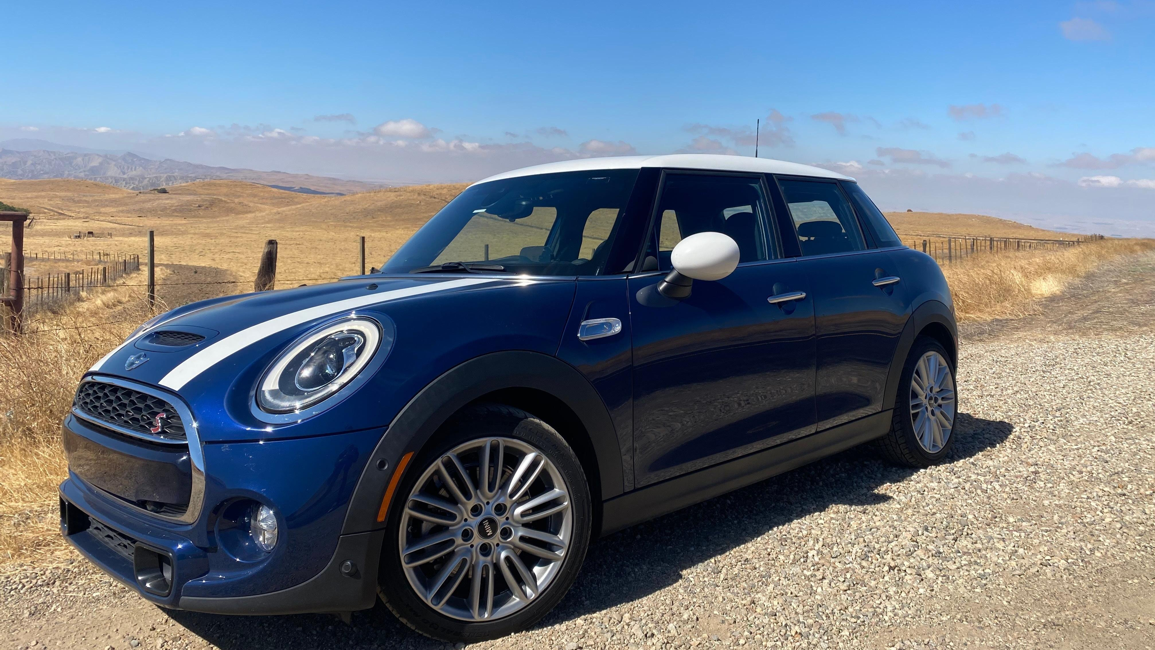 A front 3/4 shot of my blue Mini parked in front of a dry field