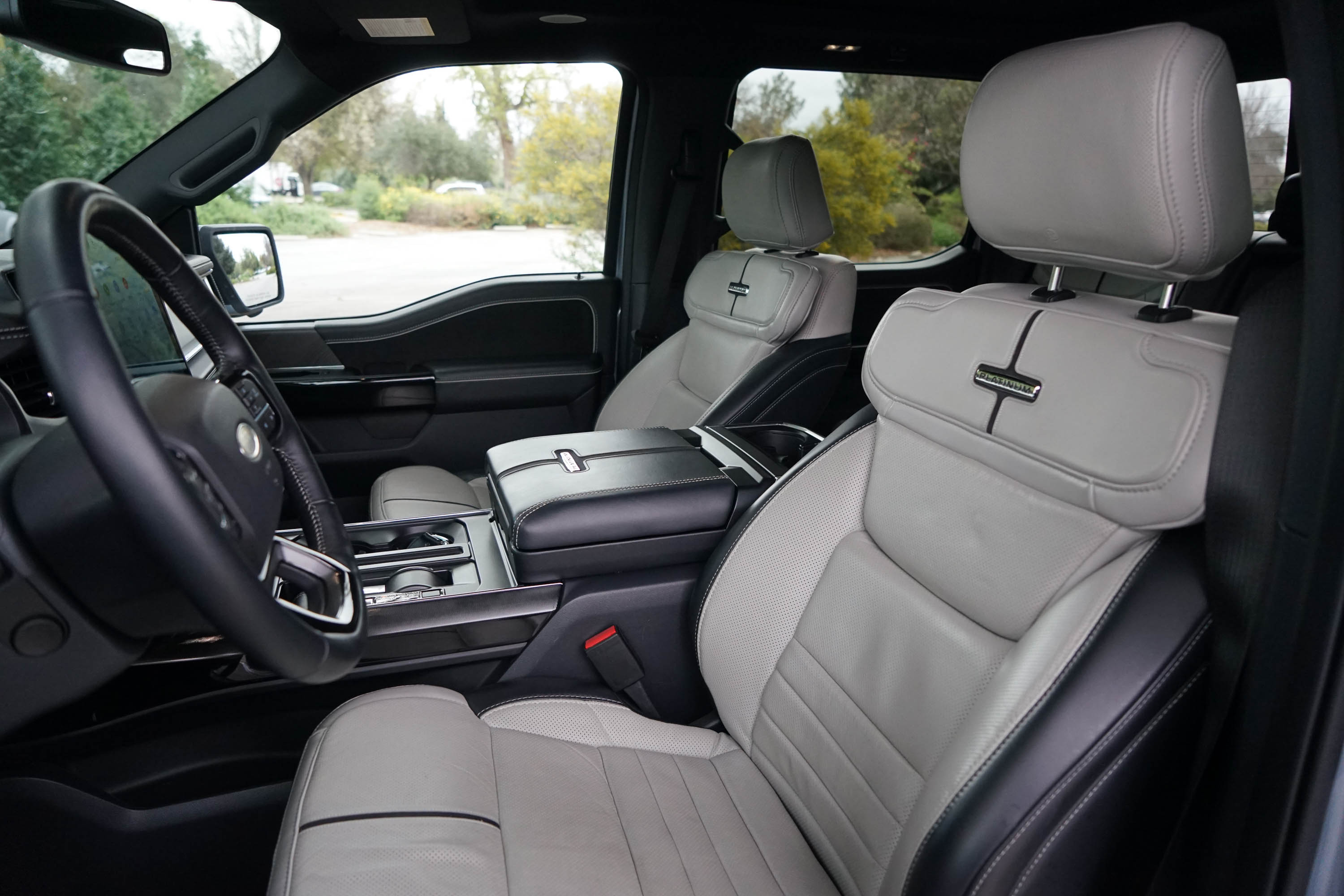 The two-tone front seats of the 2023 Ford F-150 Lightning truck.