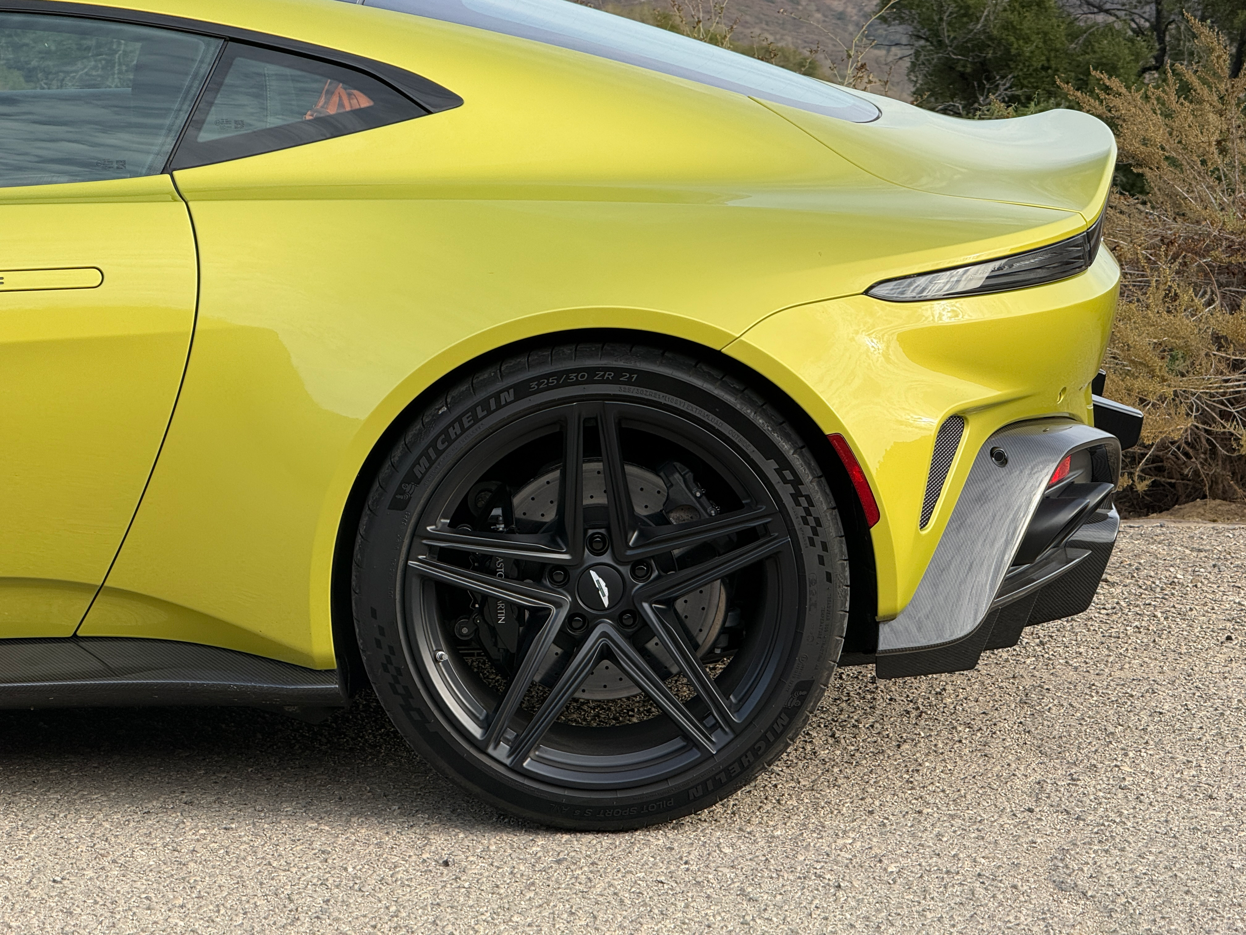 Rear wheel of a yellow 2025 Aston Martin Vantage