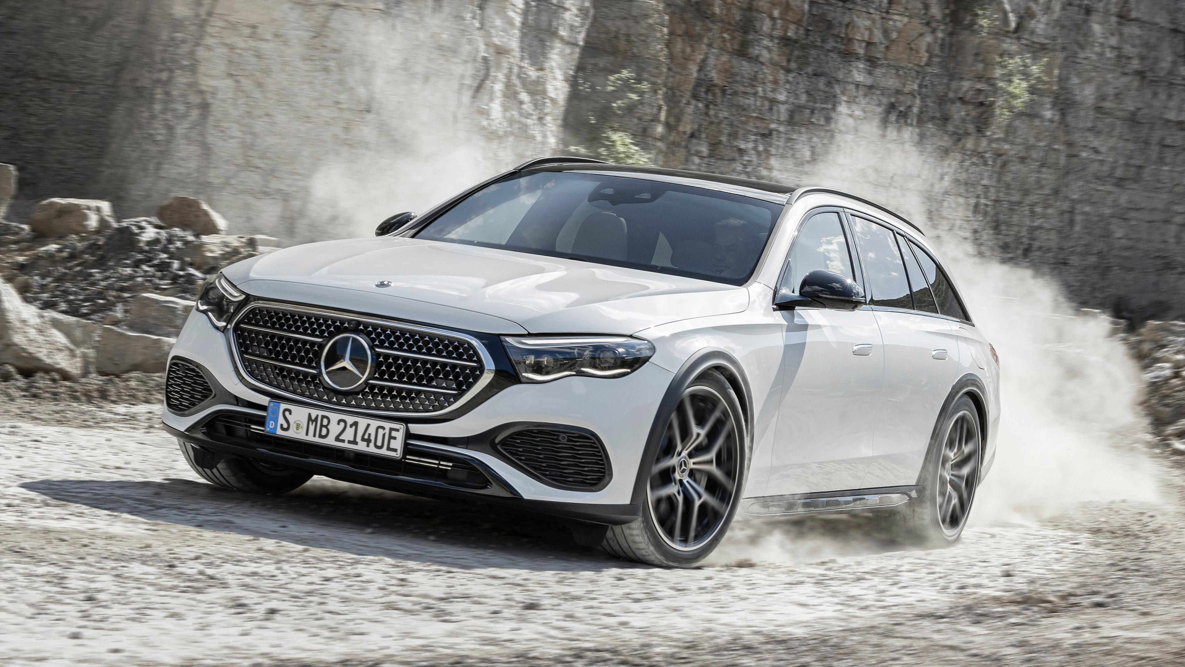 Front 3/4 view of a white Mercedes-Benz E-Class All-Terrain