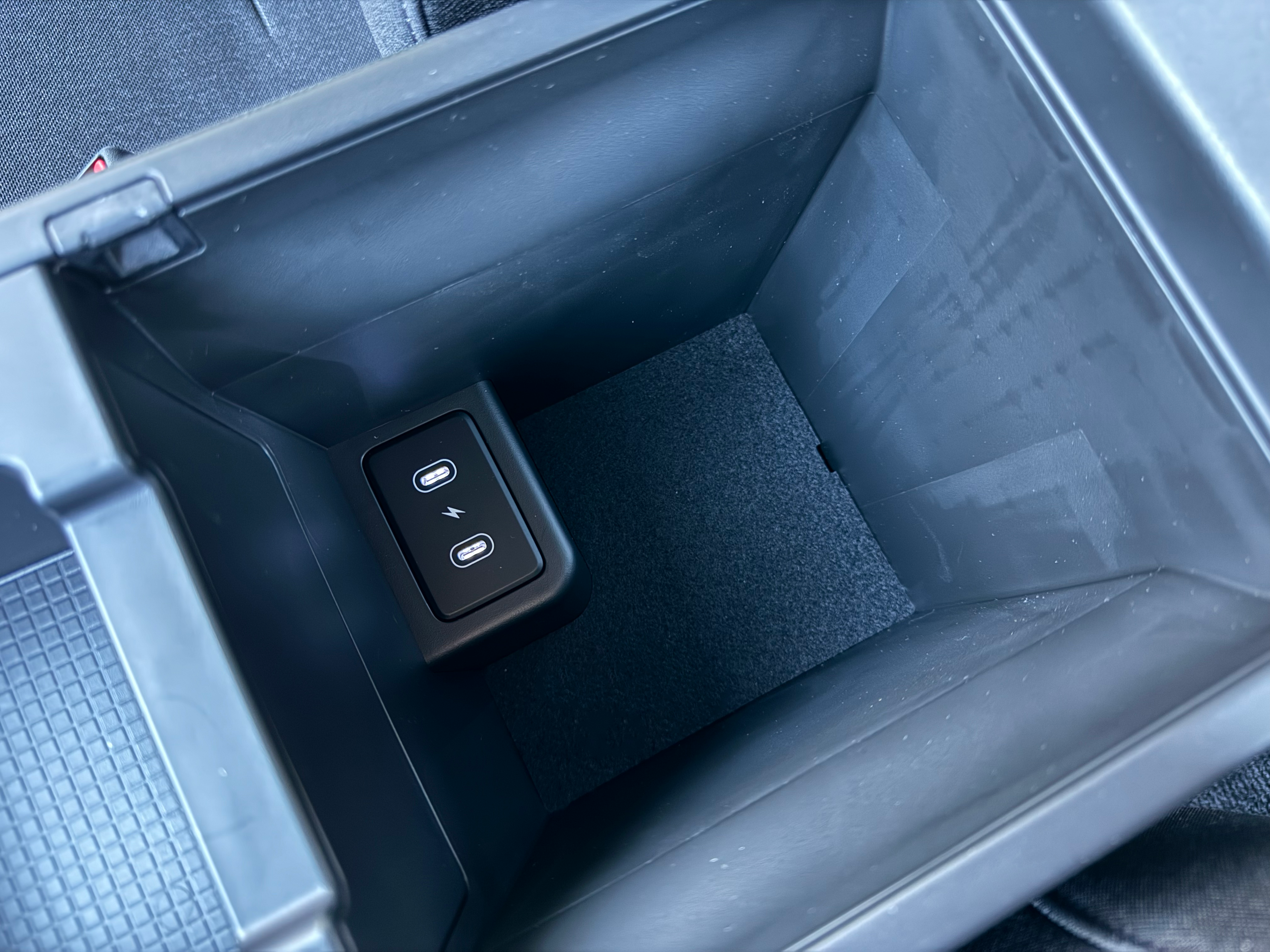 Detail shot of the center console cubby of a Hyundai Ioniq 6