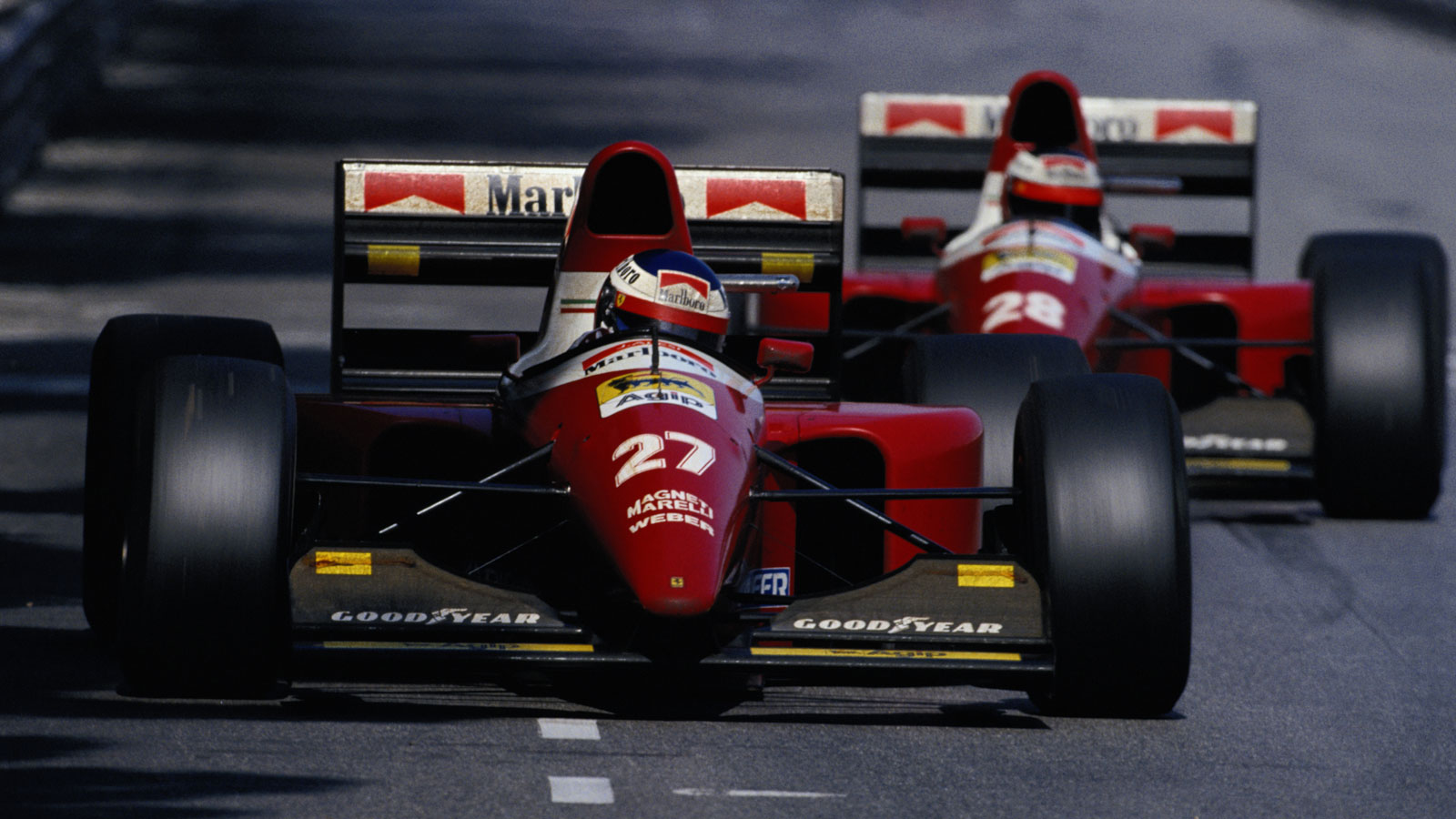 Two Ferrari F93A F1 cars race in Monaco 