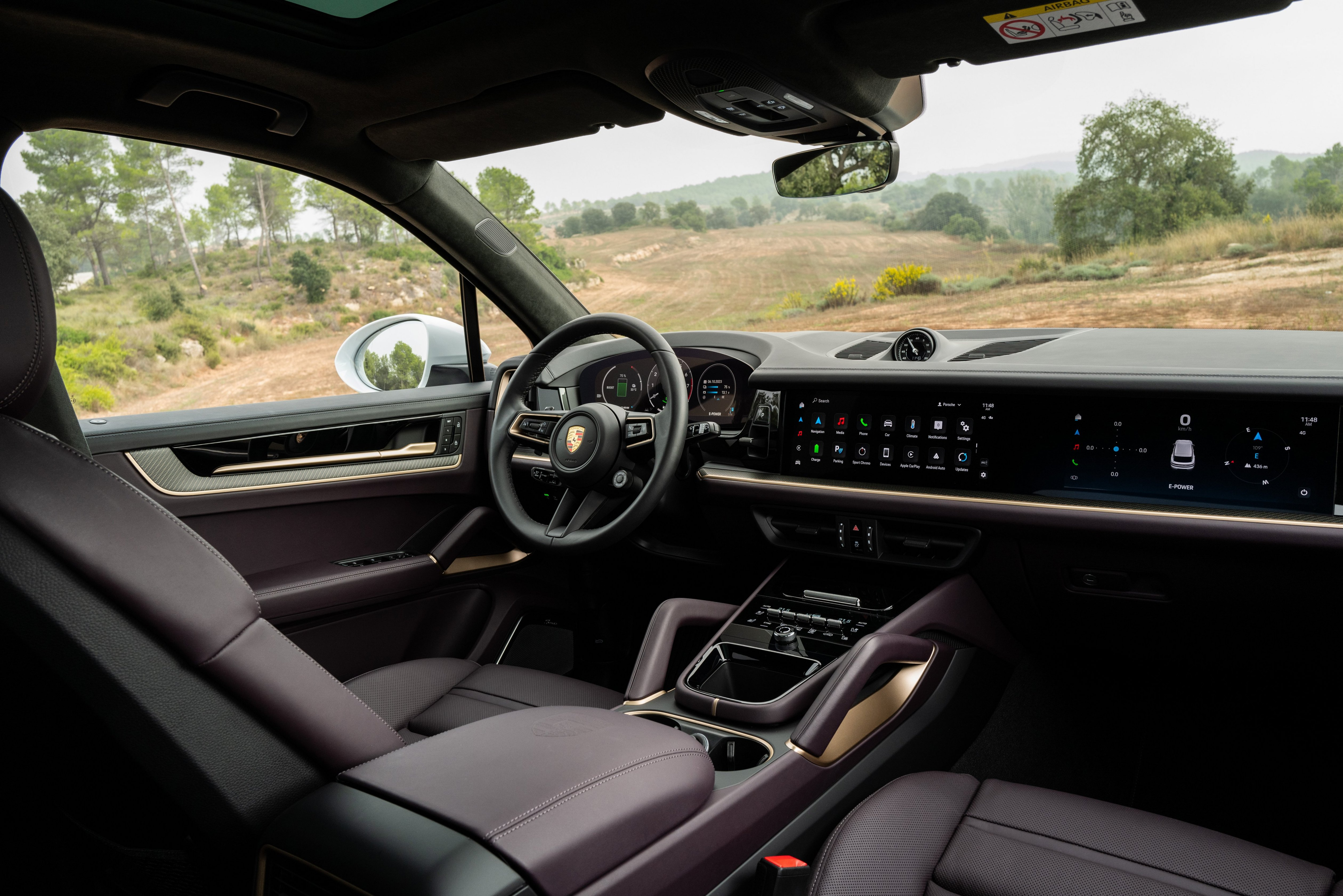 A purple and gold leather interior in the 2024 Cayenne S E-Hybrid