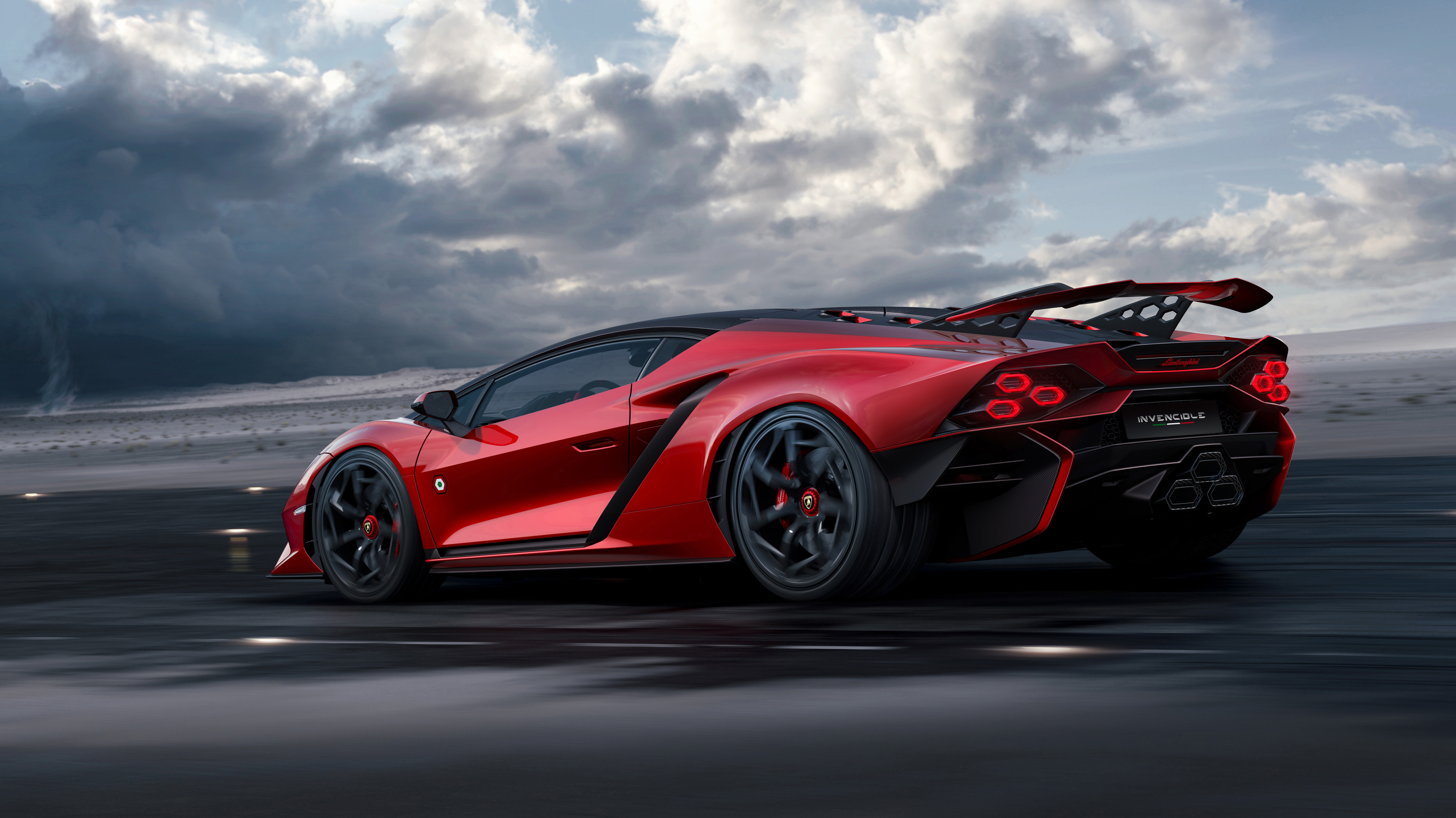 A rear three-quarter view of the red Lamborghini Autentica coupe