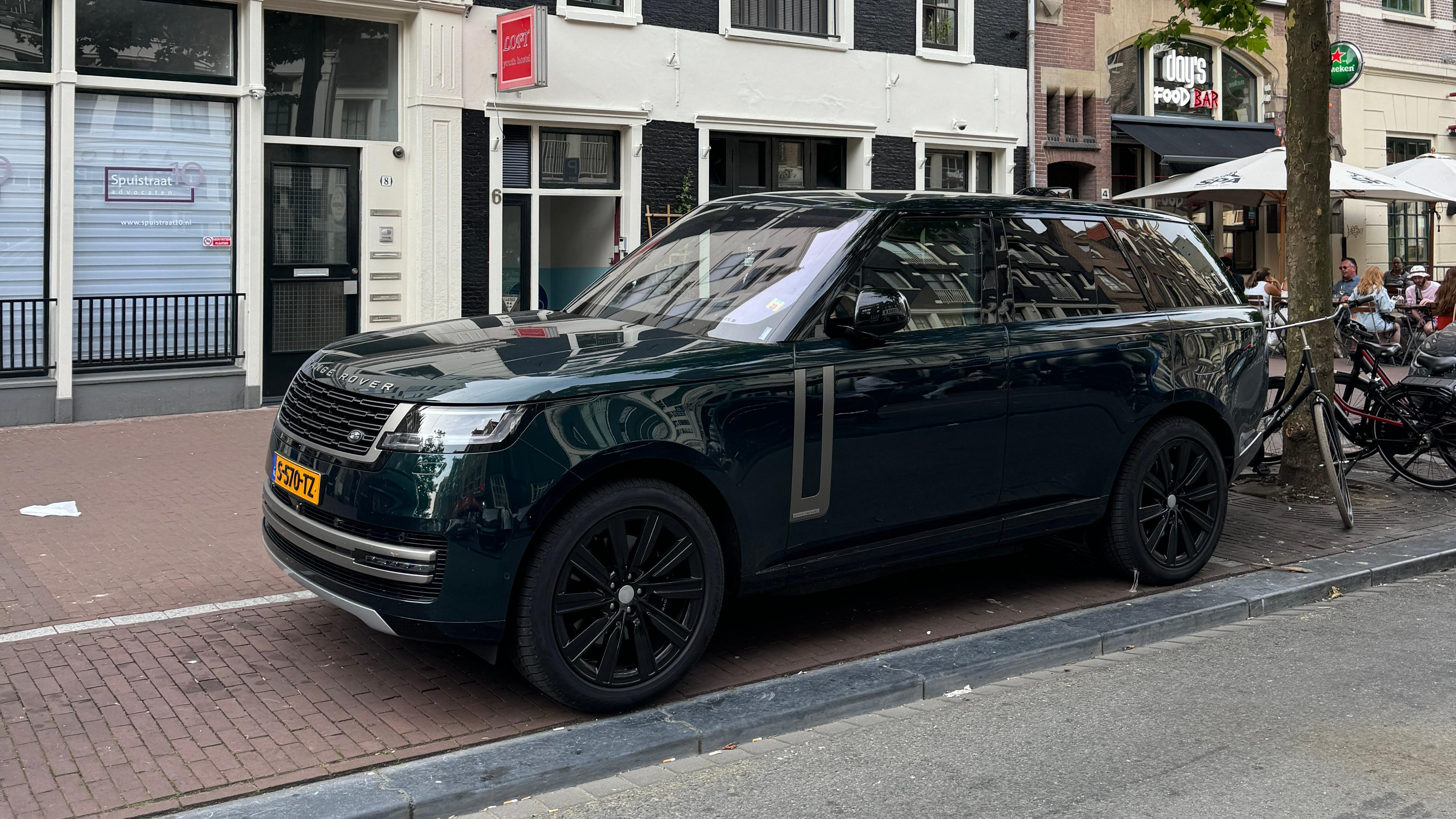 Front 3/4 view of a black Range Rover