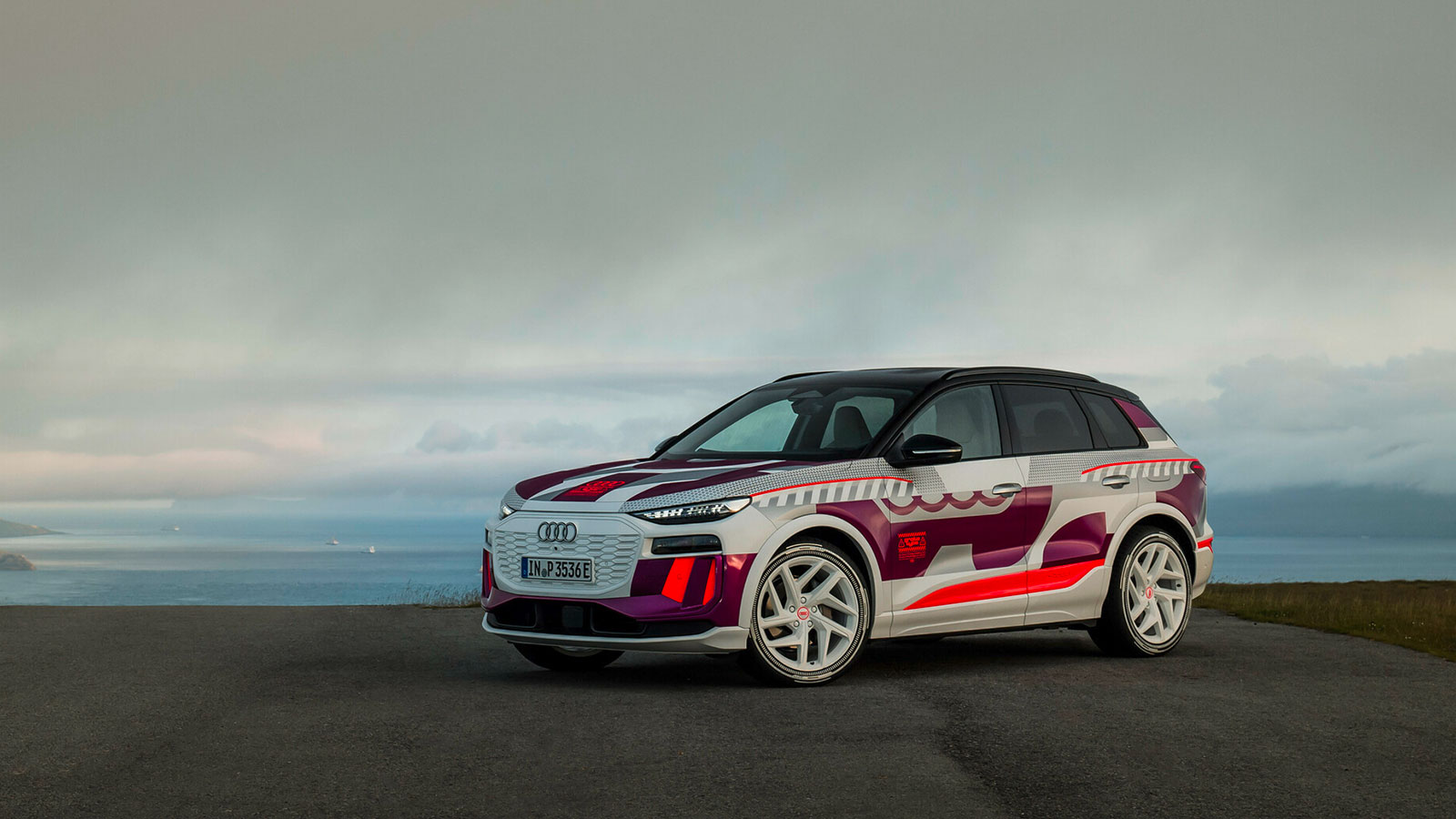 A photo of the Audi Q6 e-tron prototype car. 