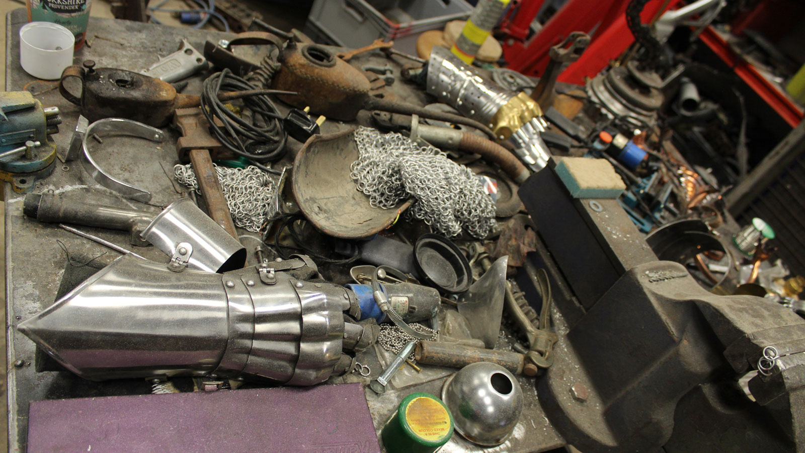 A photo of a table covered in scrap. 