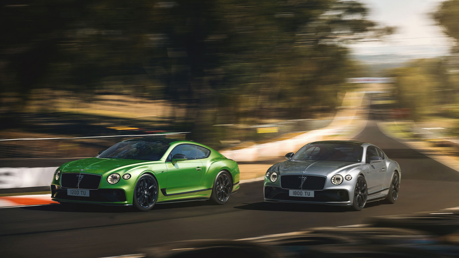 A photo of the two limited-edition Bentleys on a track. 