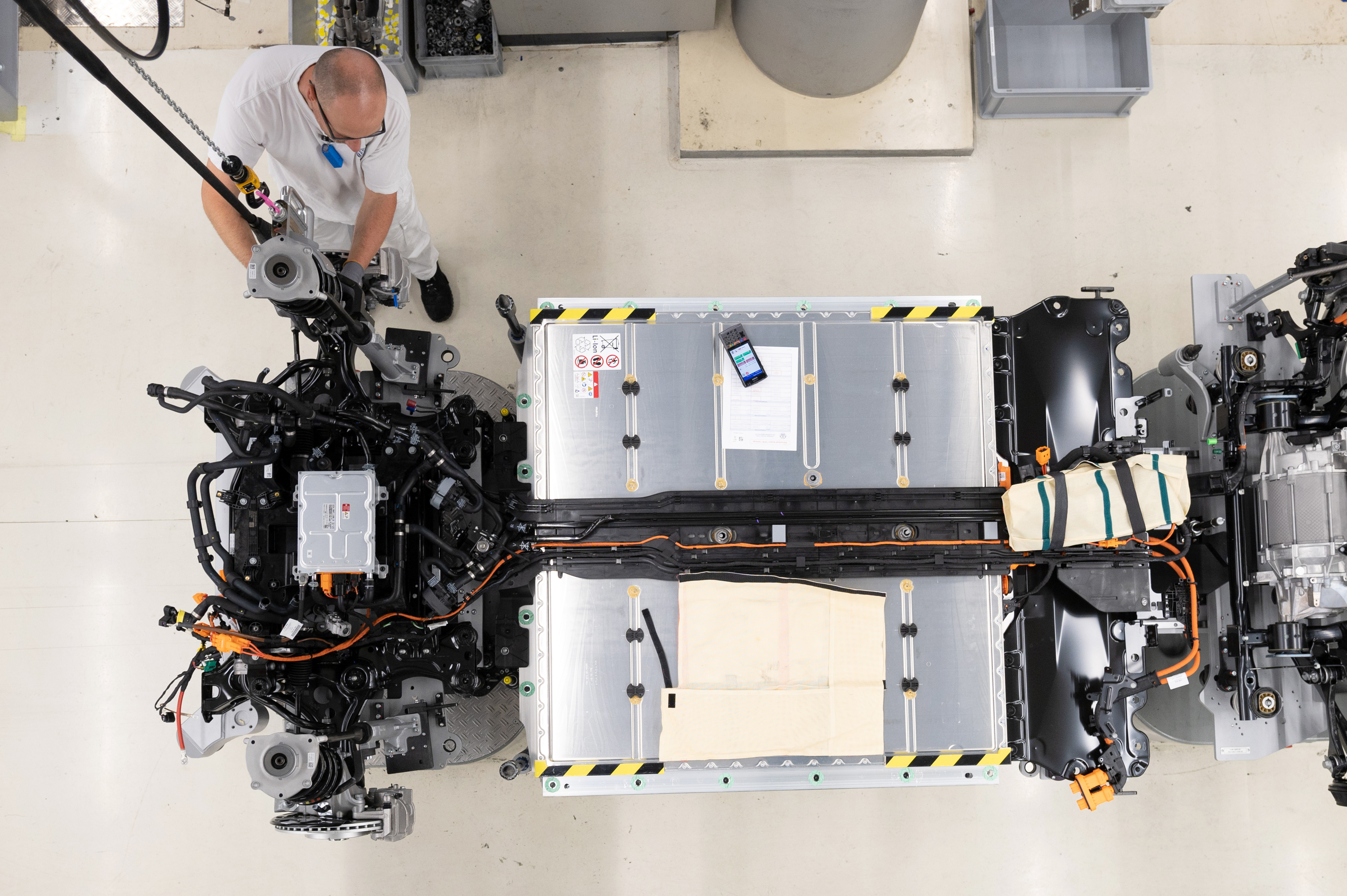 EV battery pack and motors in a factory