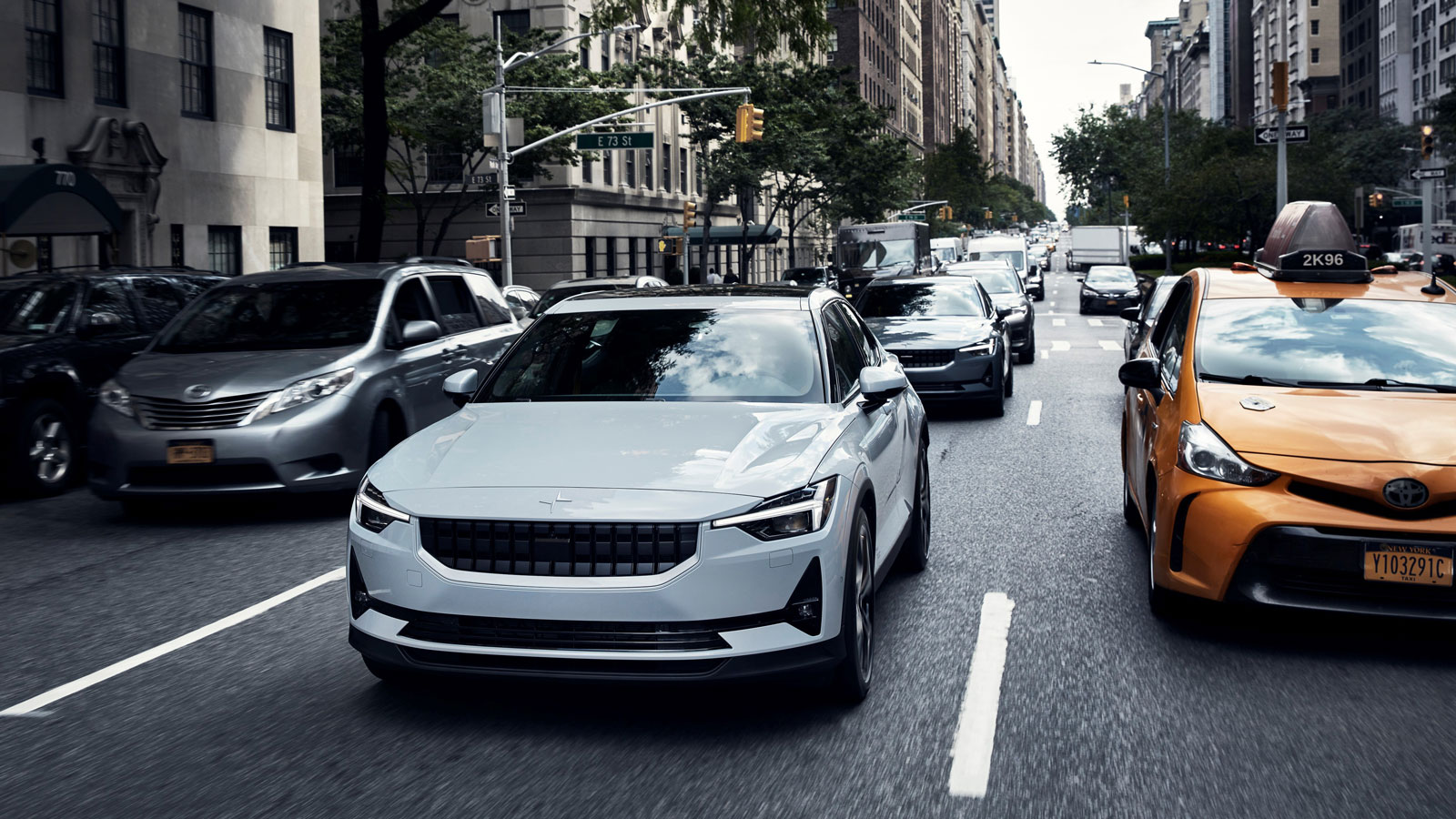 A white Polestar 2 on the streets of New York 