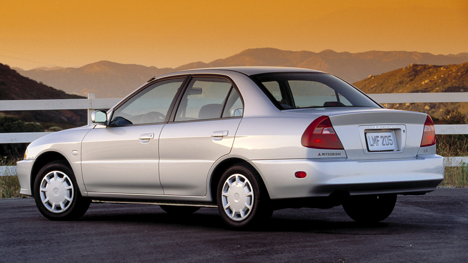 Rear quarter view of a fifth-generation Mitsubishi Mirage sedan for the North American market.