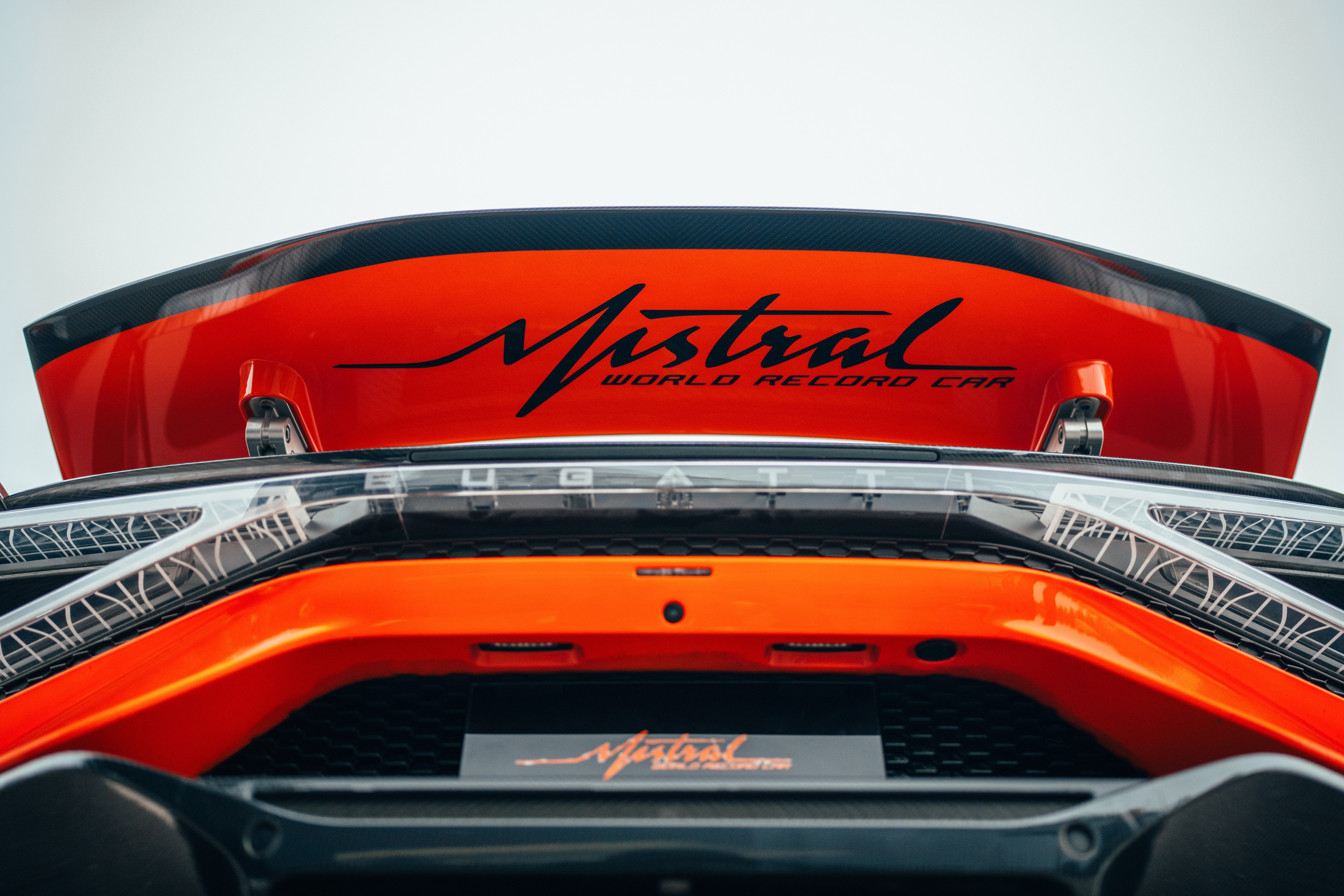 Rear wing detail of the black and orange Bugatti W16 Mistral World Record Car