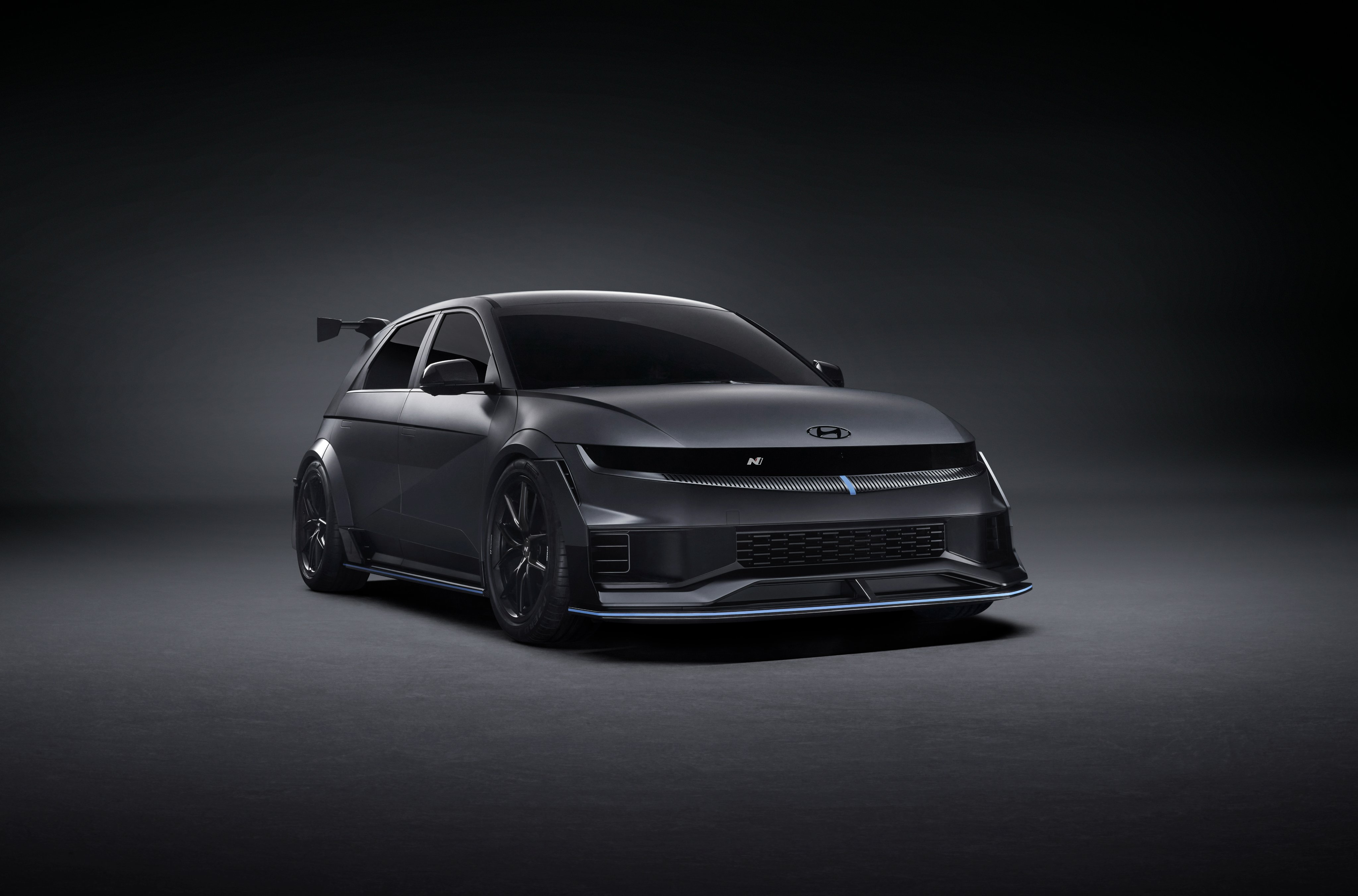 Front 3/4 view of a matte black Hyundai Ioniq 5 N NPX1 tuner concept