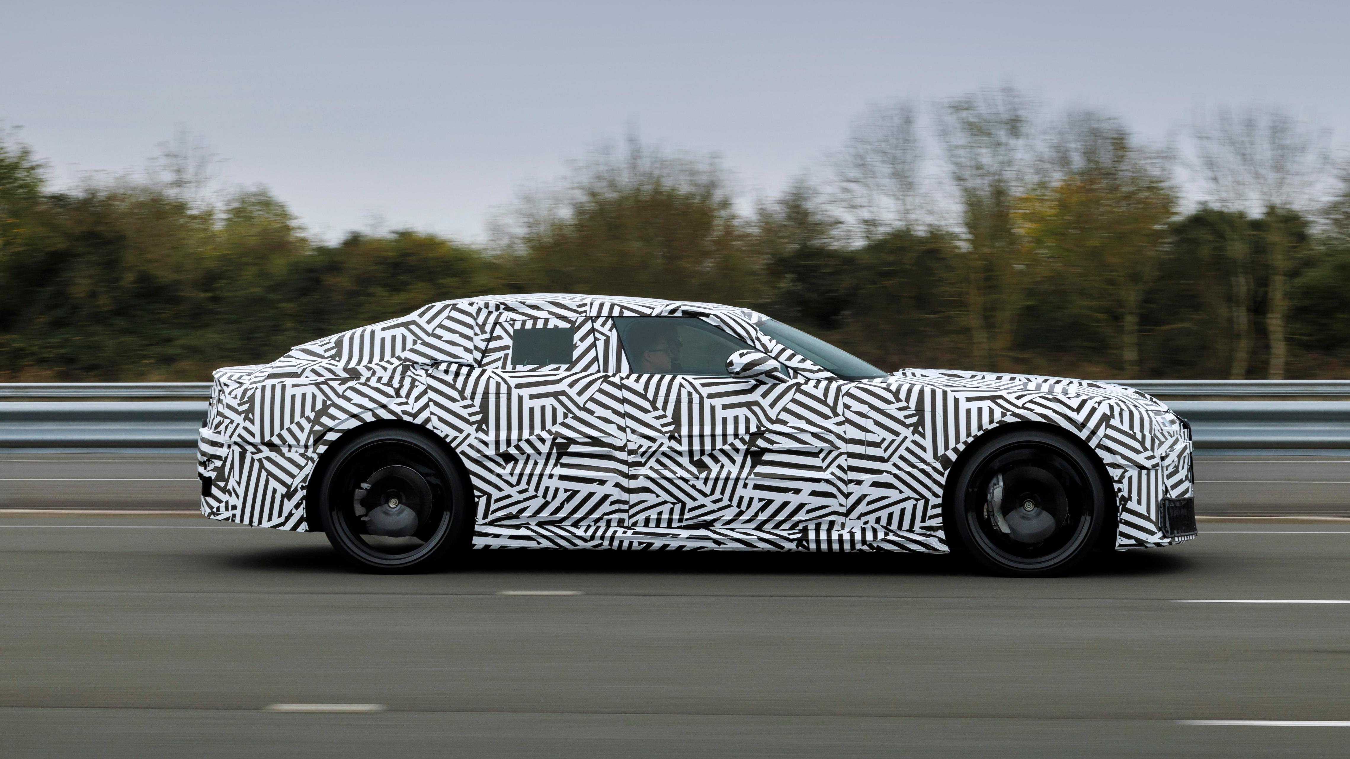 Side view of a camouflaged Jaguar prototype