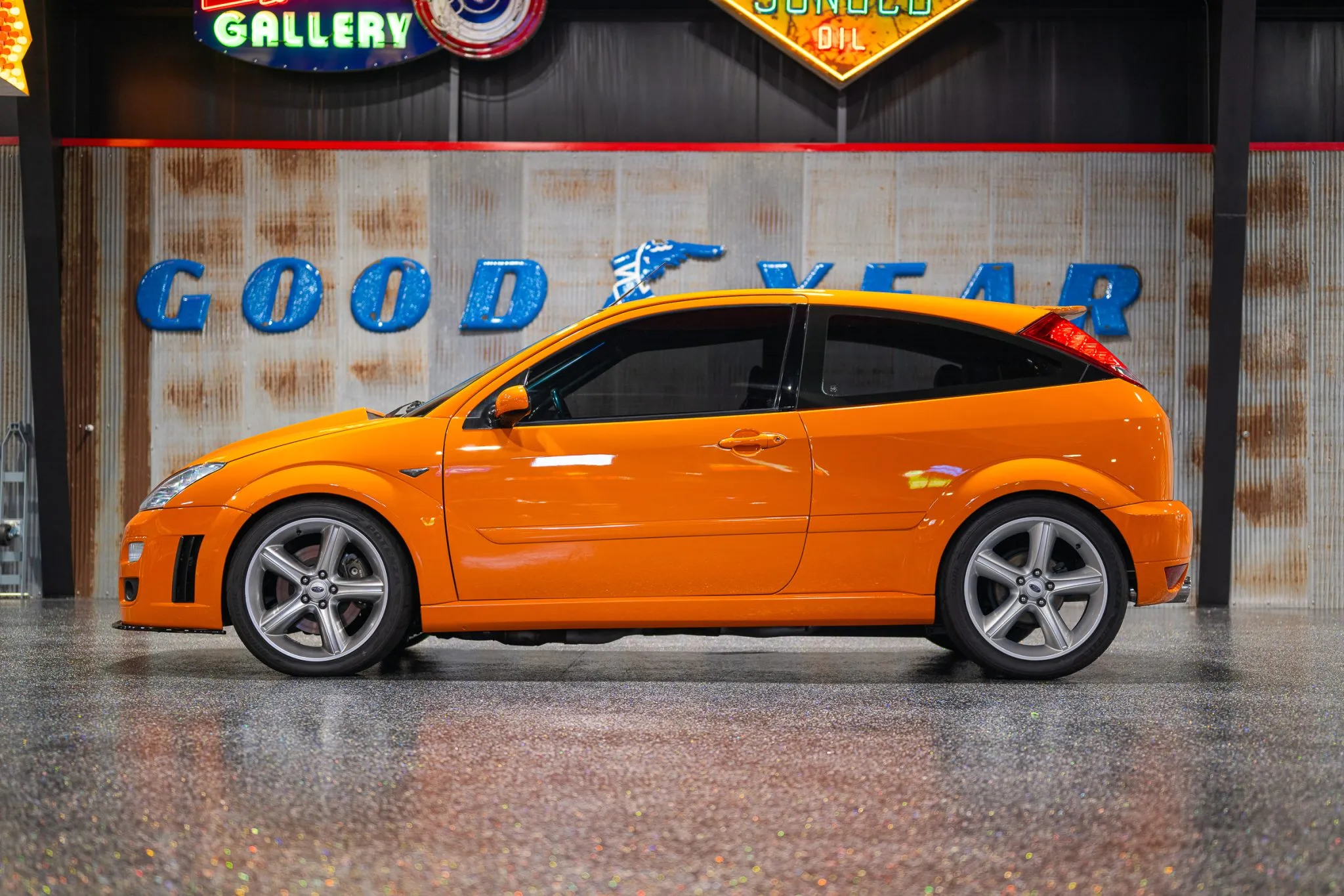 A side-view of the orange Focus