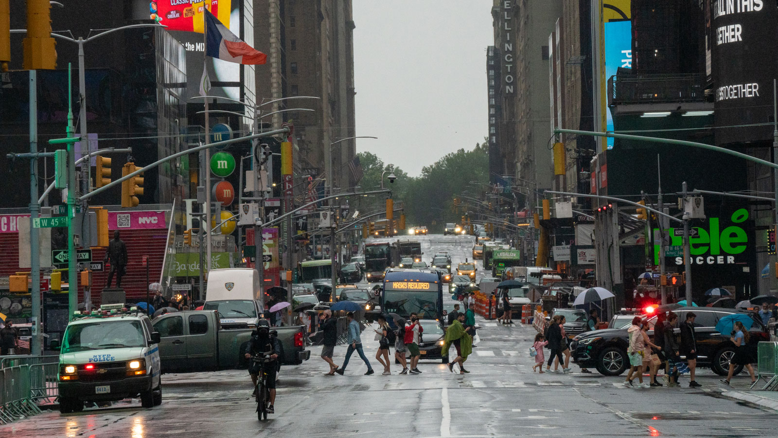 A photo of a road through Times Square 