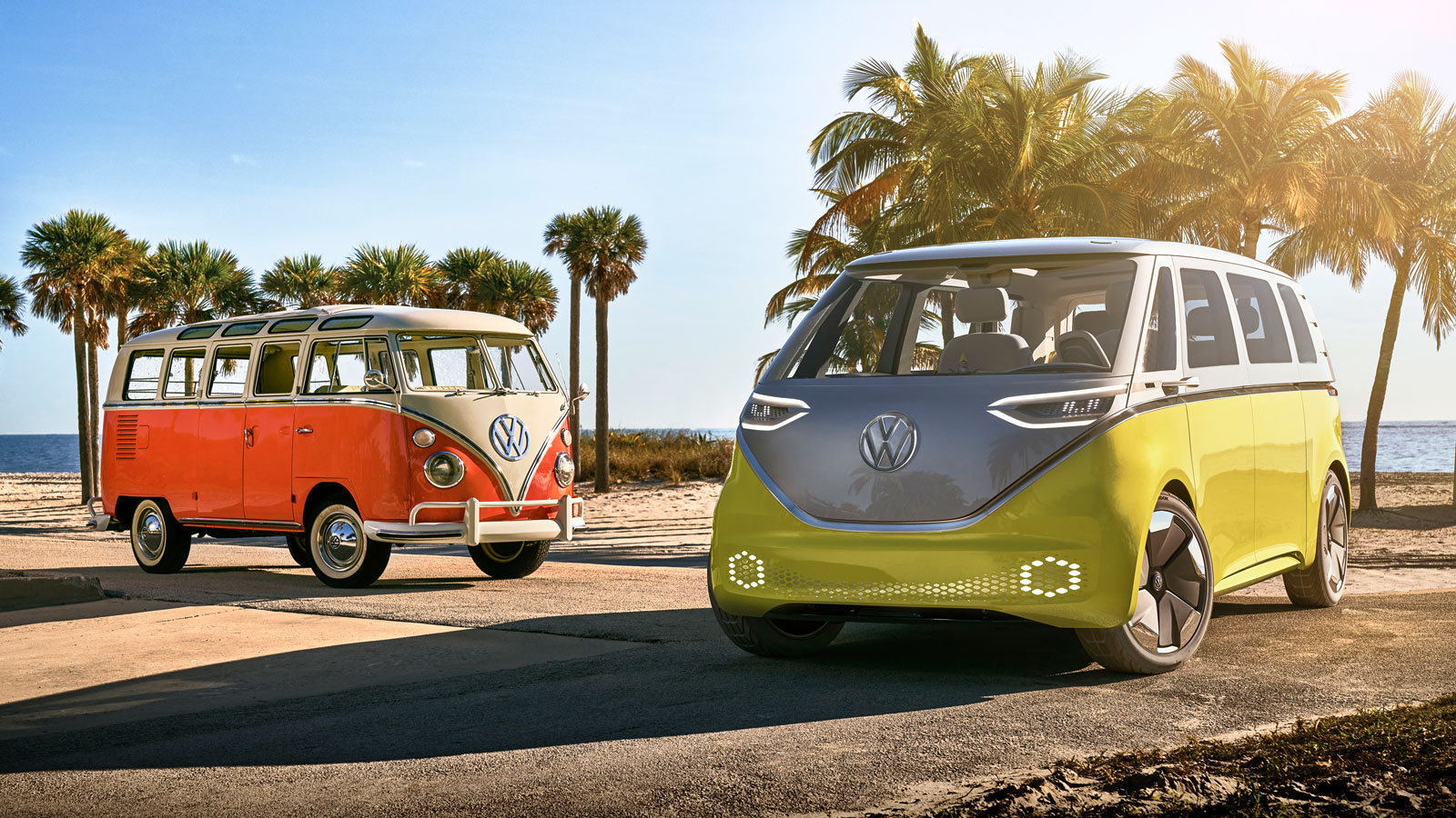 A vintage VW splitscreen van parked alongside the ID Buzz concept. 