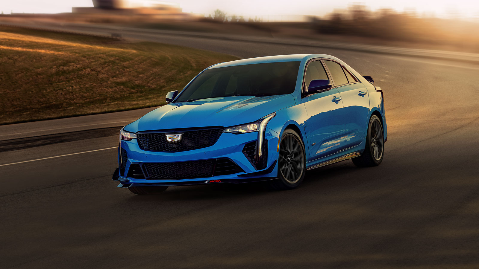 A photo of the bright blue Watkins Glen inspired Cadillac CT4-V Blackwing sedan