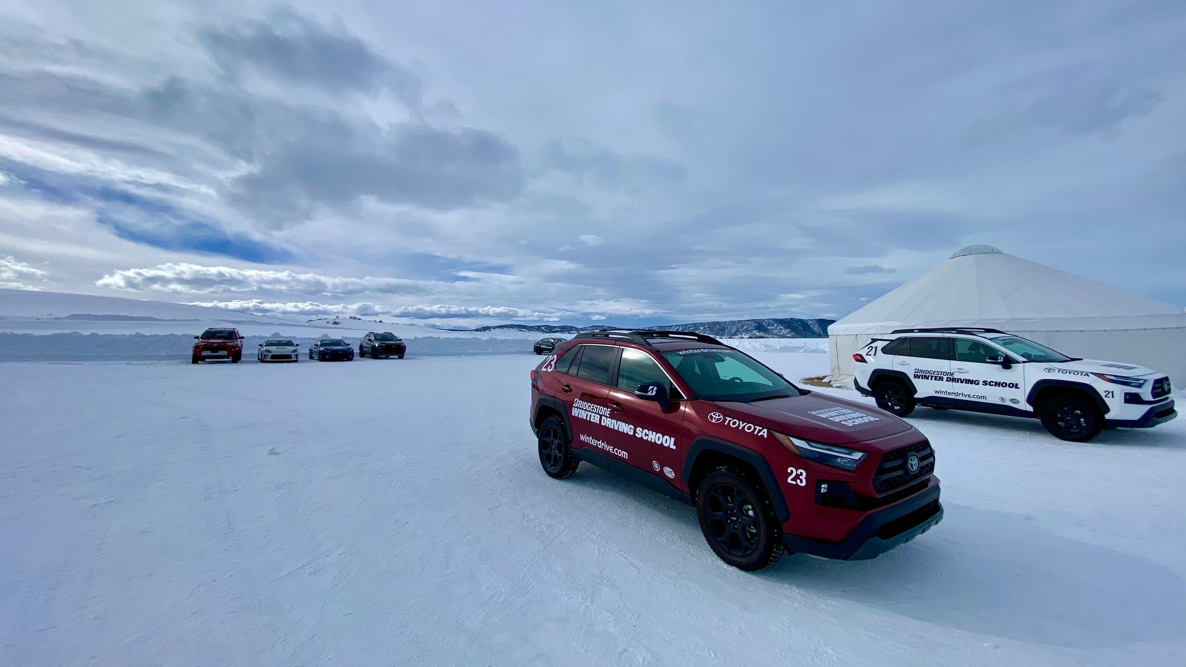 A closer photo of a red Rav4 TRD with the Bridgestone Driving School decals