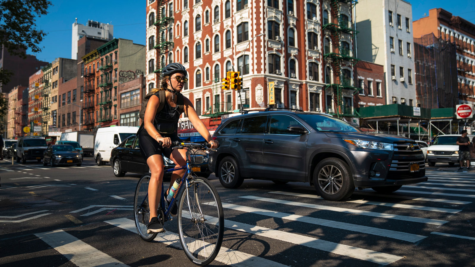 A photo of a bike rider in New York City. 