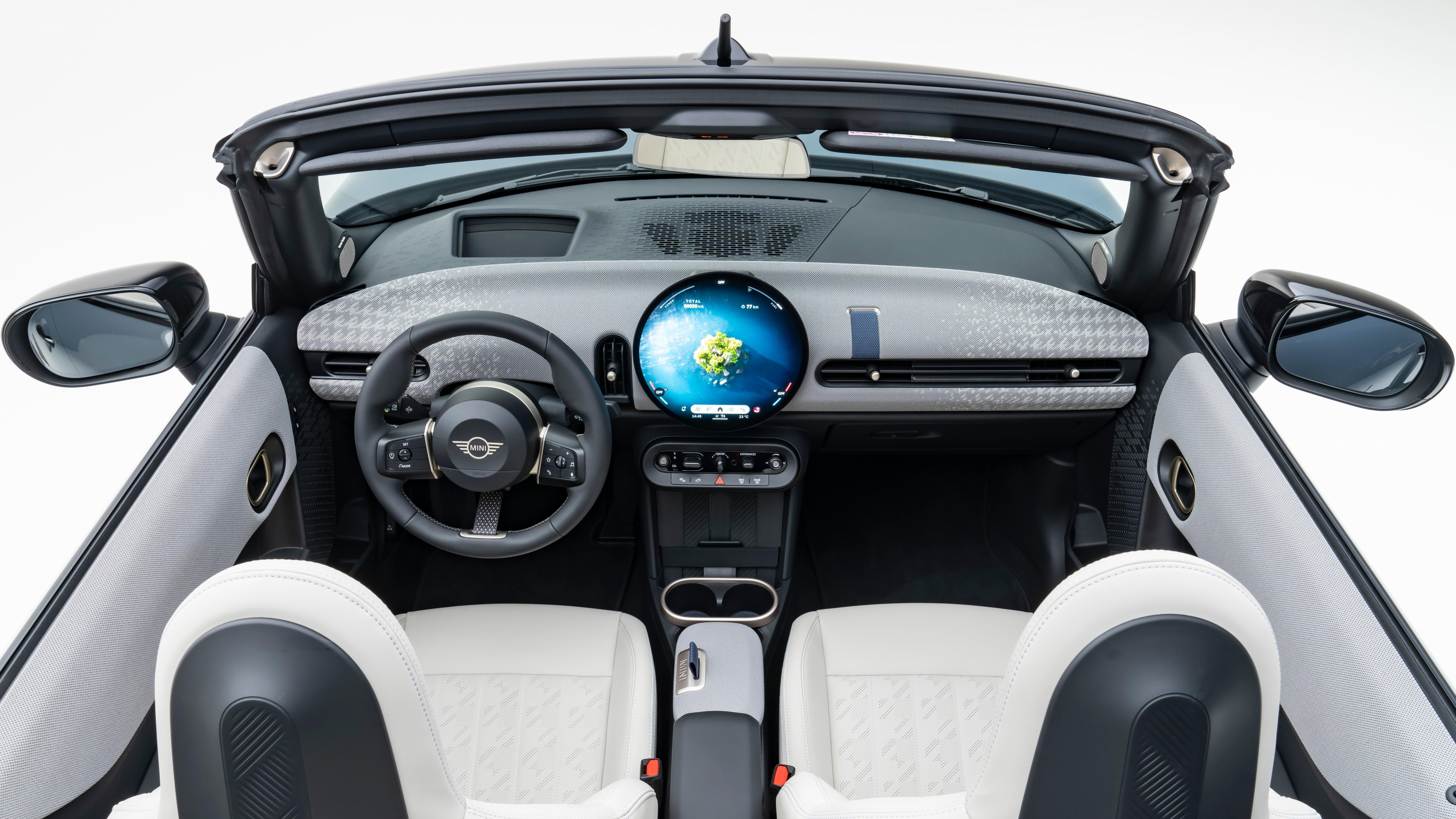 An overhead shot of the front seats and dash of the Mini Cooper Convertible 