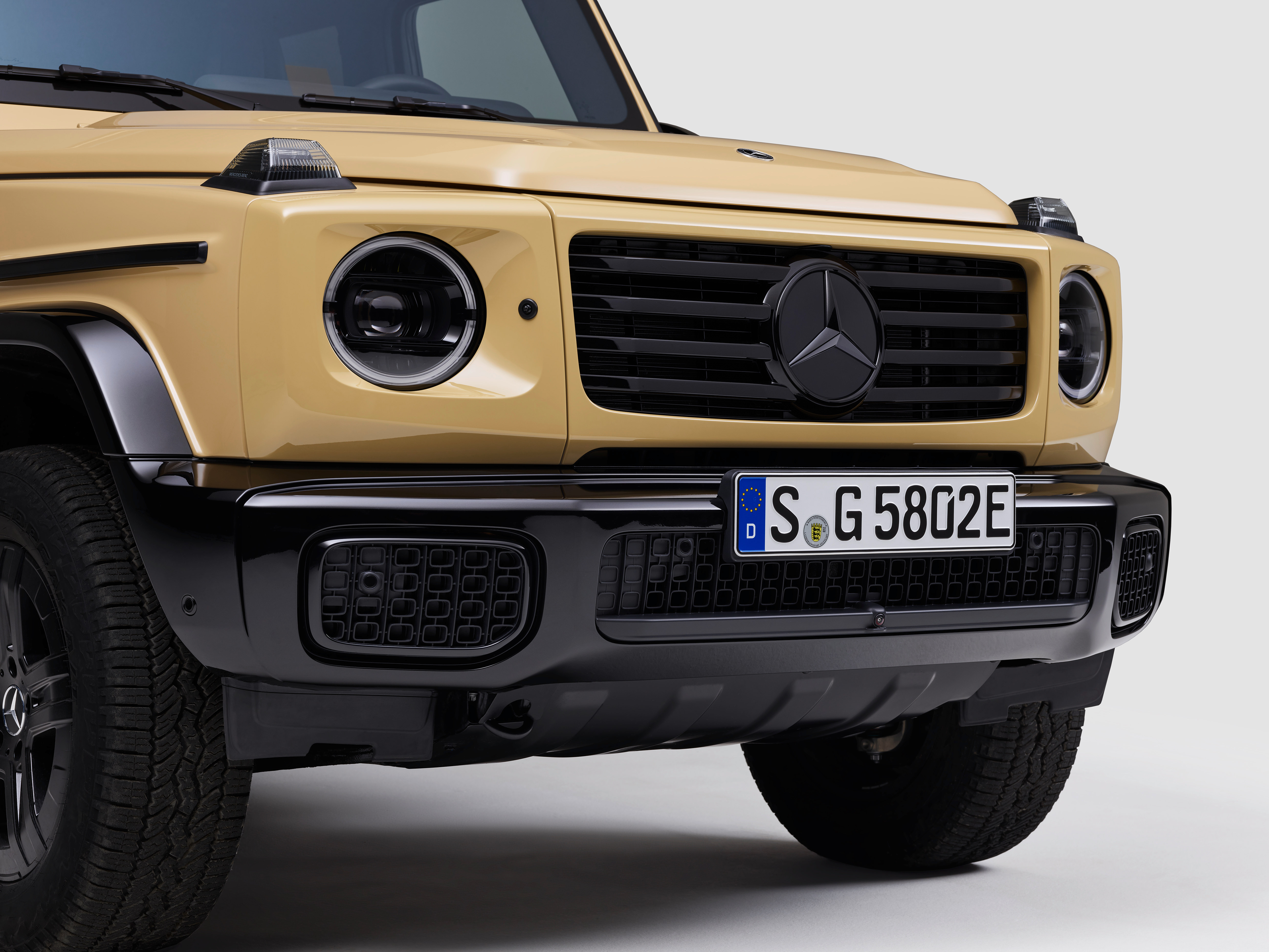 Front end of a beige 2025 Mercedes-Benz G580 EV