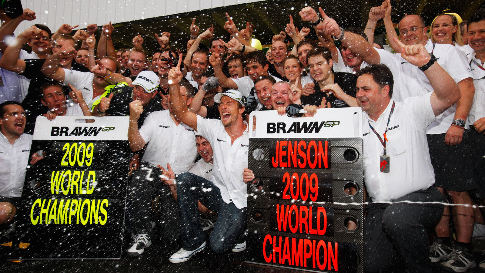 A photo of the Brawn GP celebrating in 2009. 