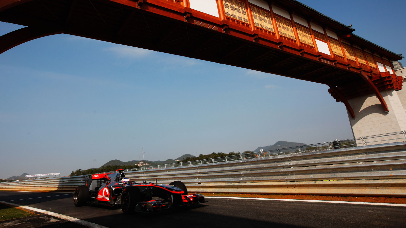 Jenson Button drives his McLaren round the Korean grand Prix circuit in 2010