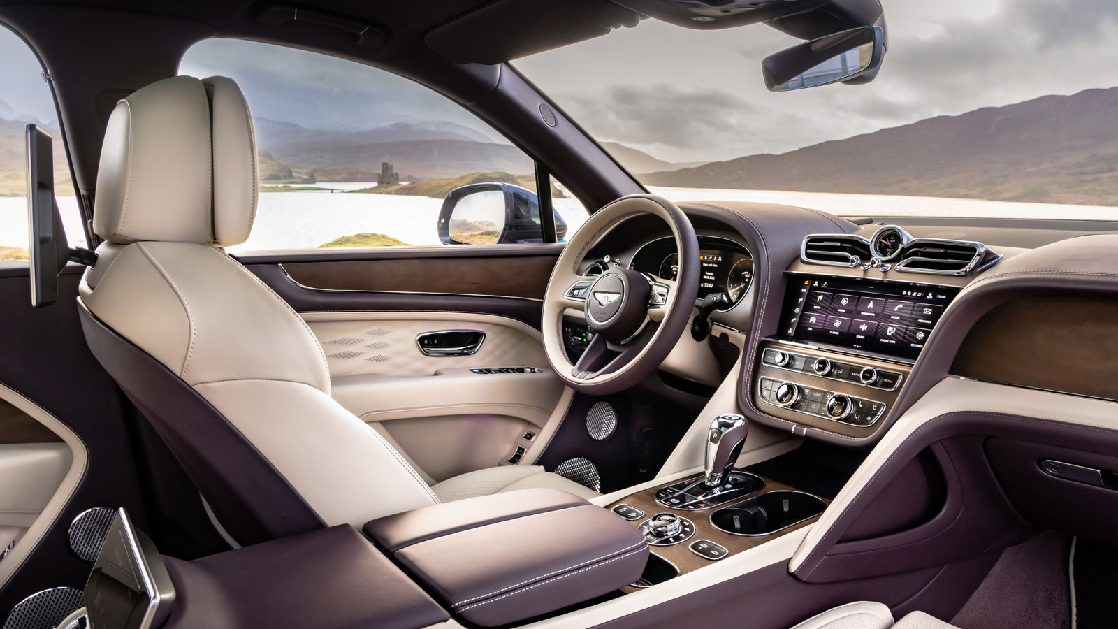 A photo of the front seat and dashboard in a Bentley Bentayga EWB 