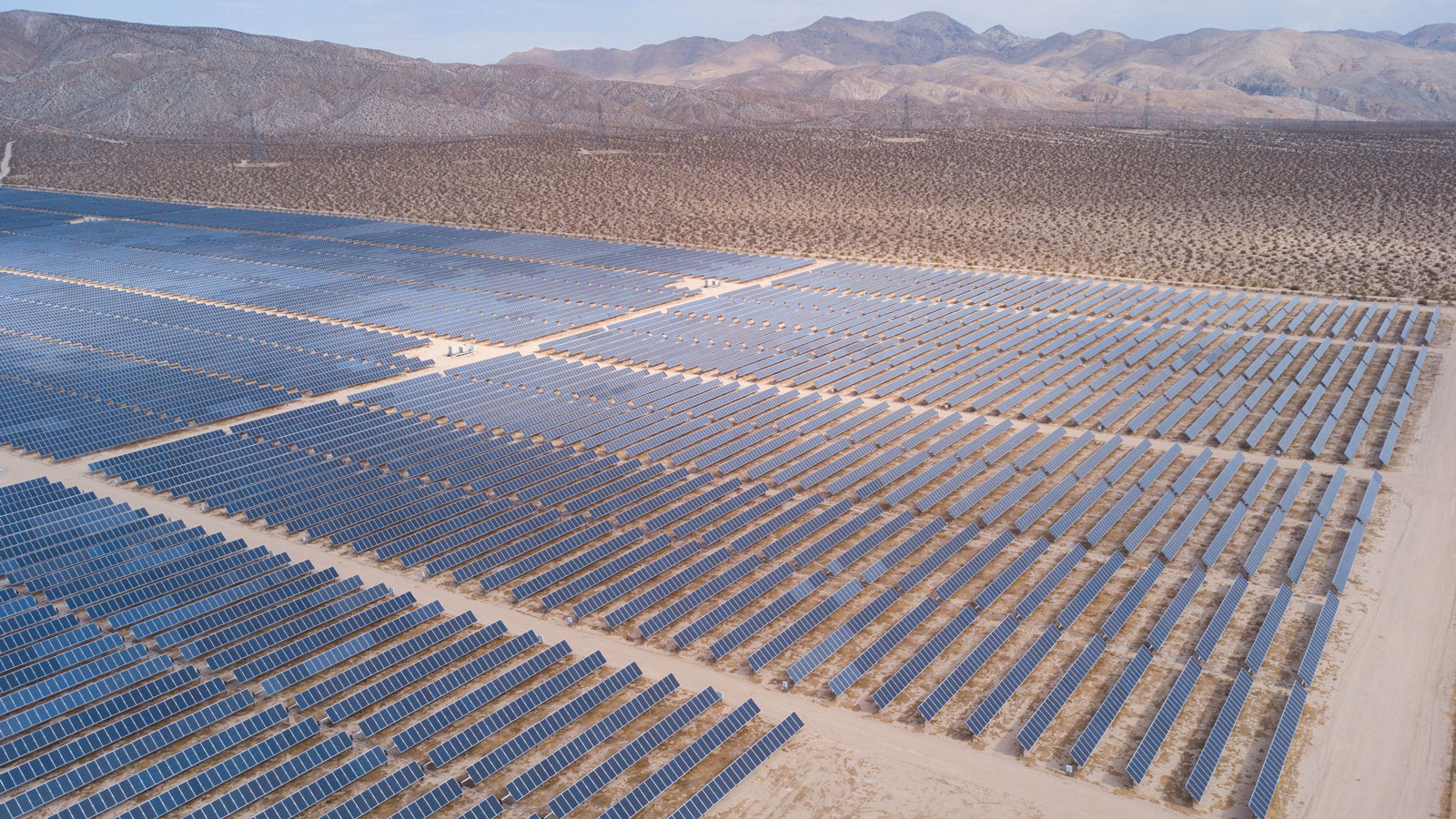 An aerial photo of a field full of solar panels in California. 