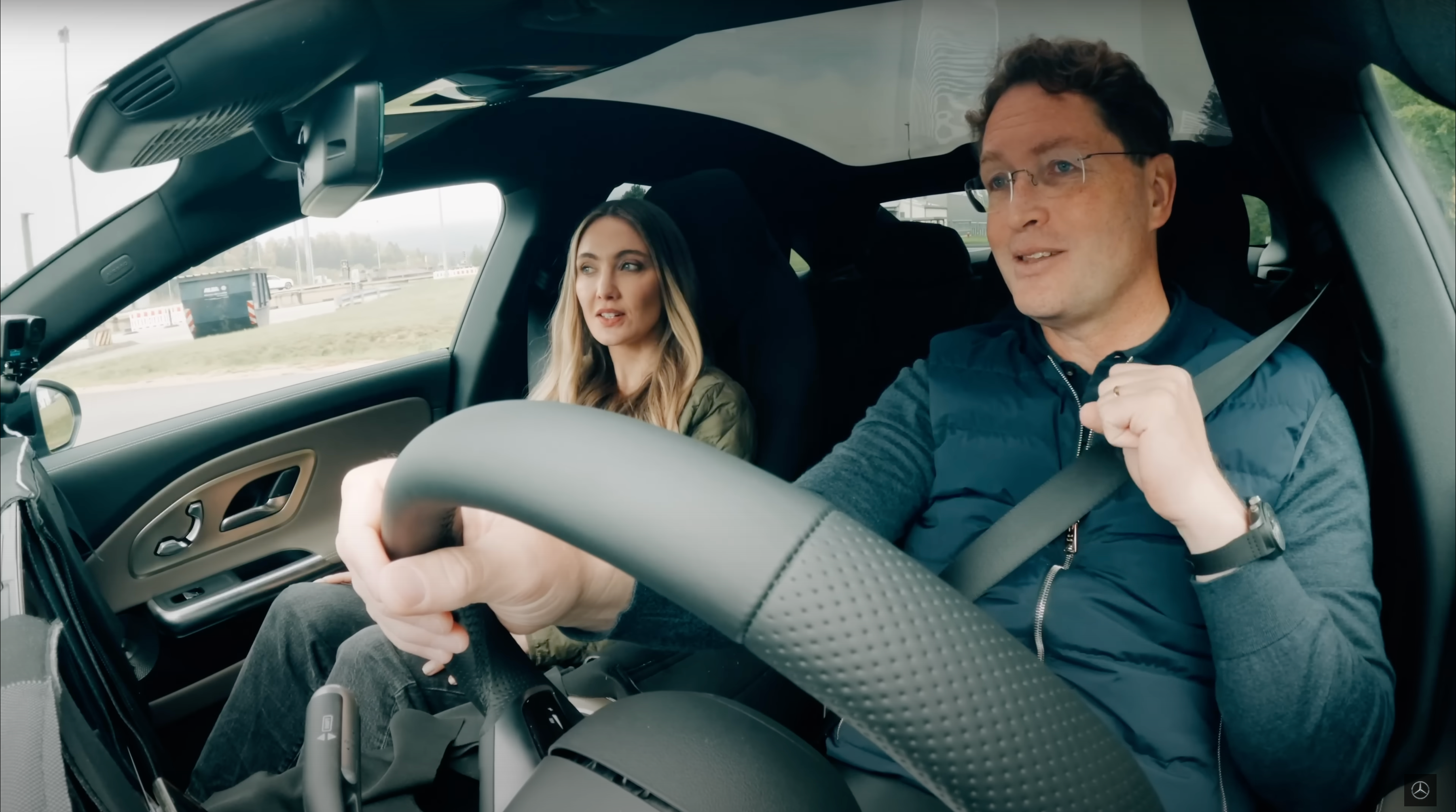 Two people sitting in a 2025 Mercedes-Benz CLA