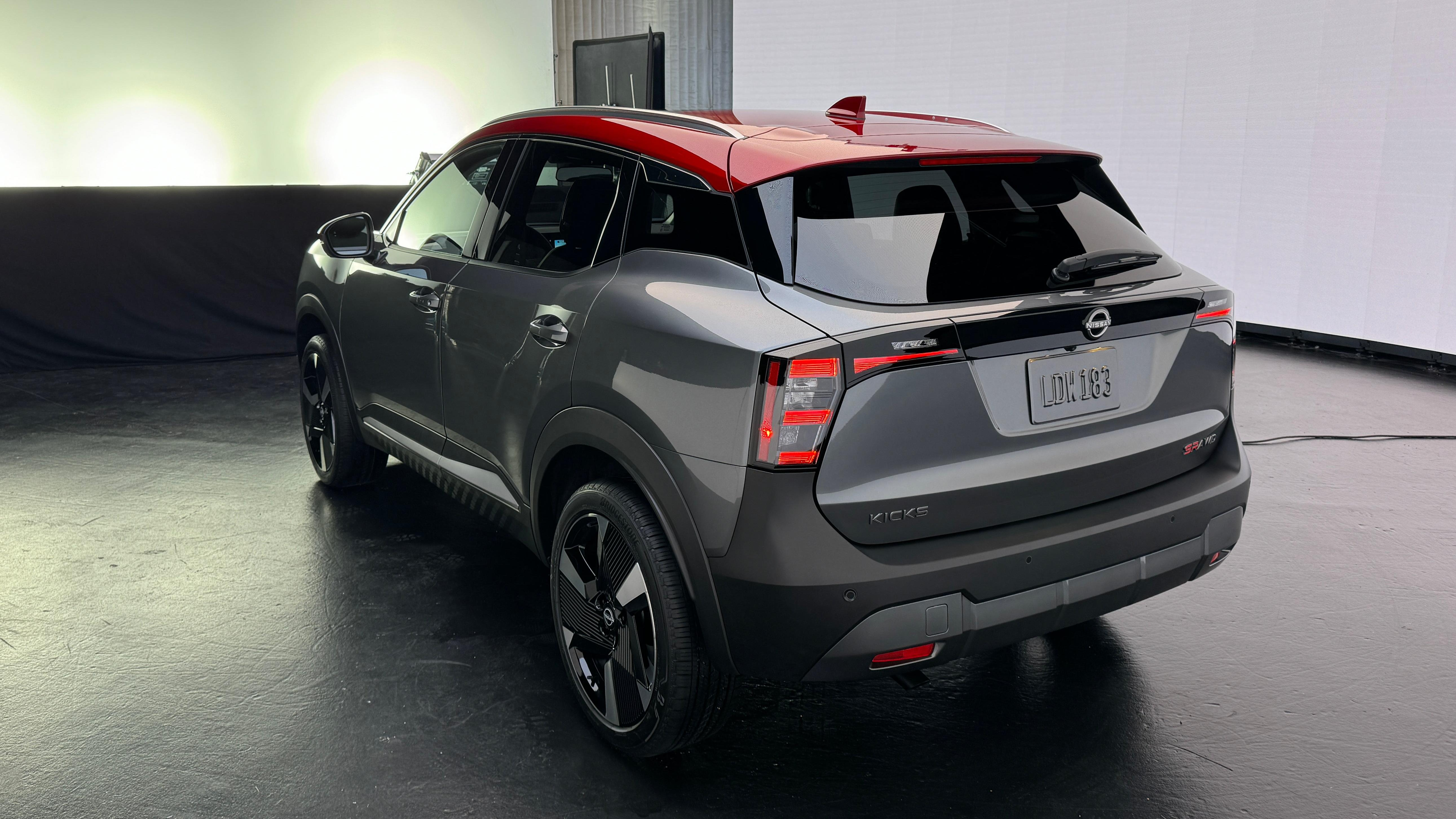 Rear 3/4 view of a grey 2025 Nissan Kicks