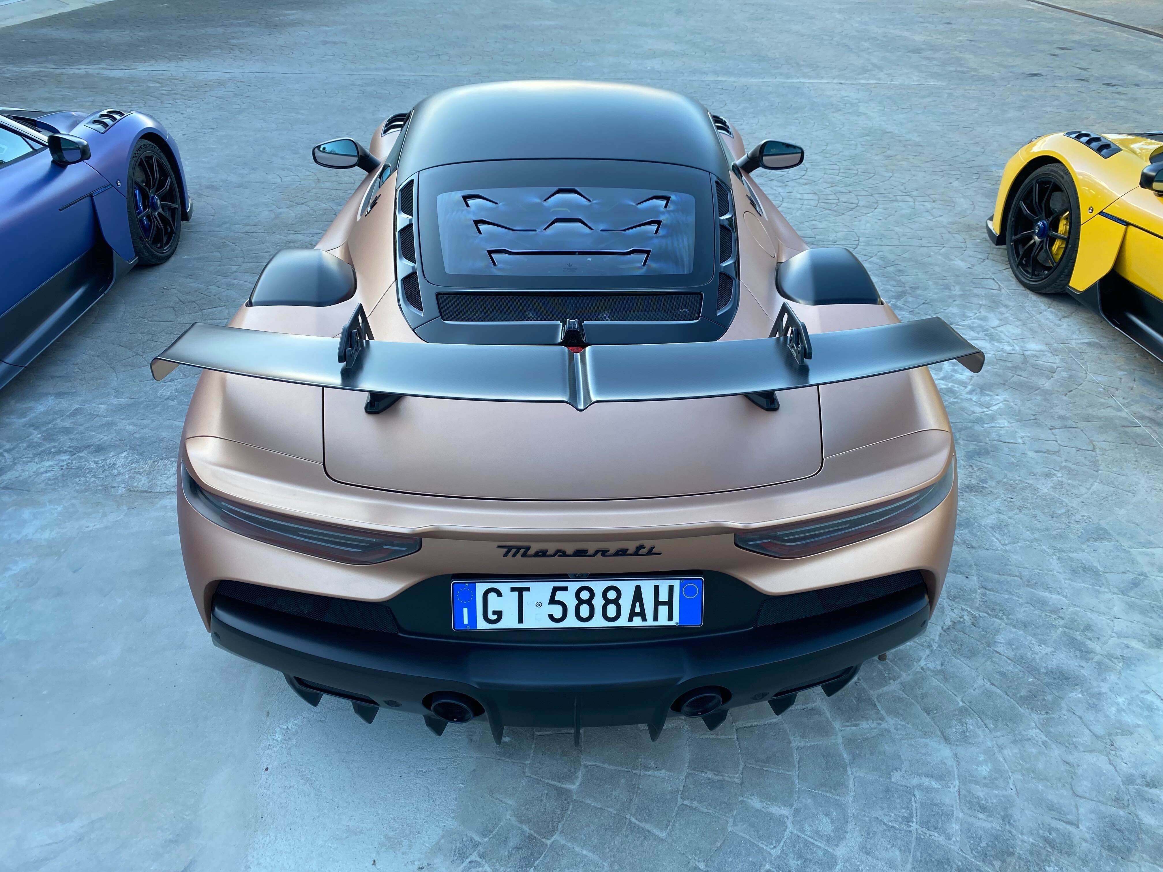 the rear of a bronze GT2 Stradale